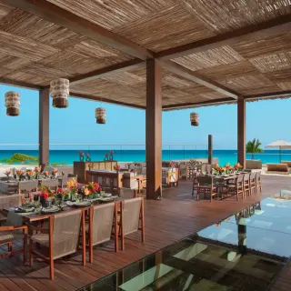 Ennea restaurant wedding reception with ocean views at Hyatt Vivid Grand Island, Cancun