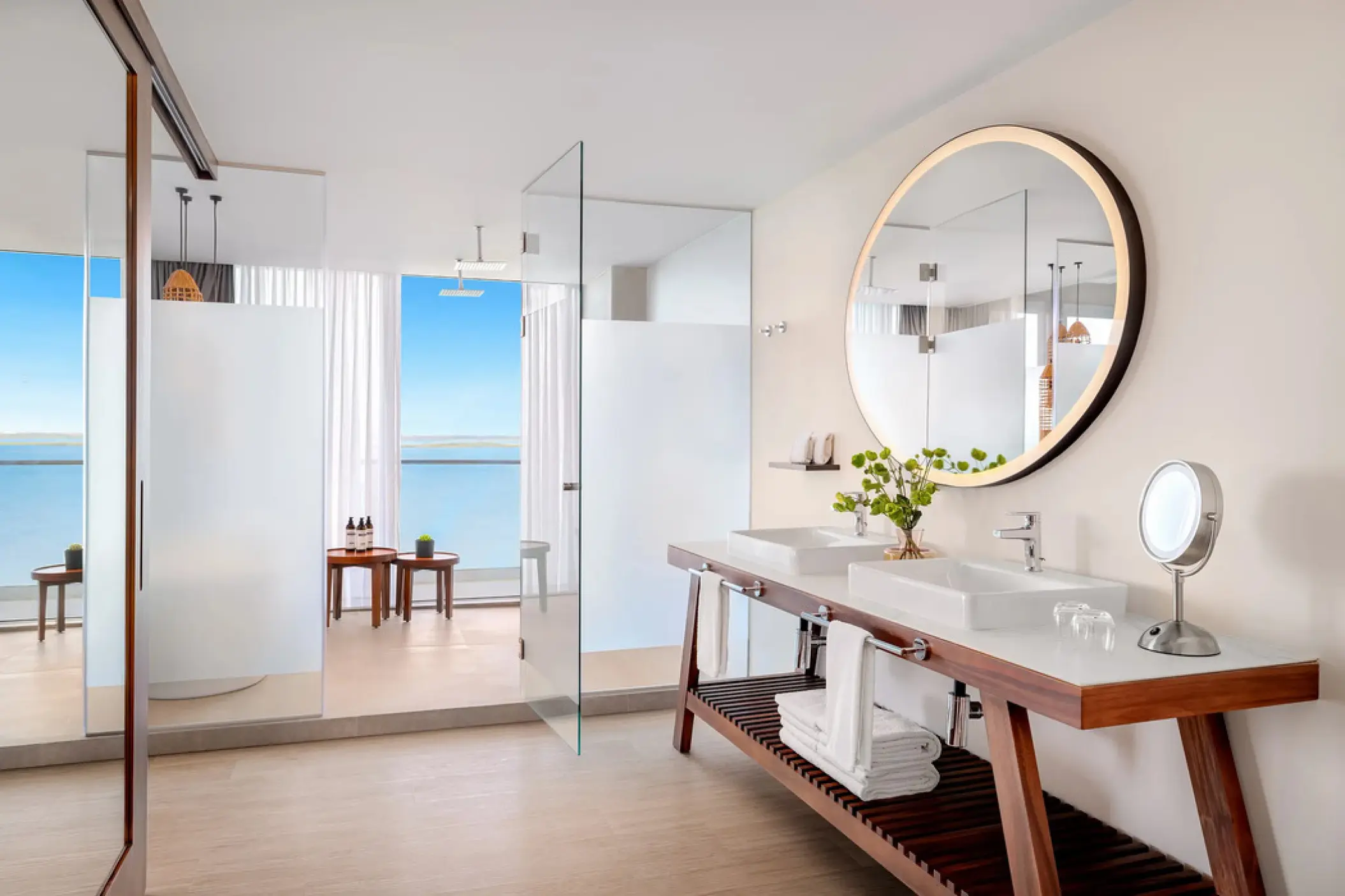 Modern ensuite bathroom with double vanity and ocean views at Hyatt Vivid Grand Island, Cancun