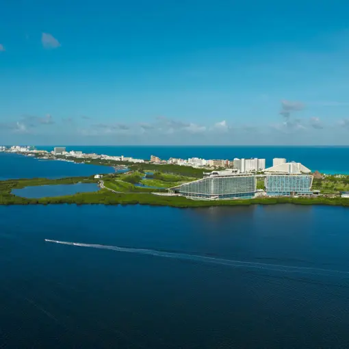 Aerial view of Hyatt Vivid Grand Island between the Nichupte Lagoon and Caribbean Sea, Cancun