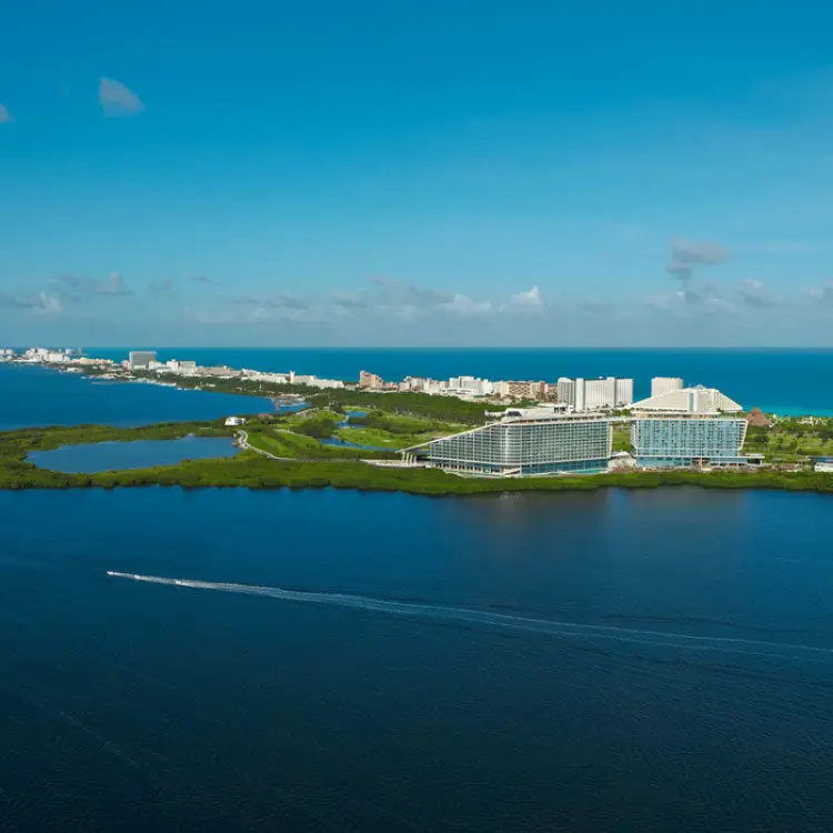 Aerial view of Hyatt Vivid Grand Island between the Nichupte Lagoon and Caribbean Sea, Cancun