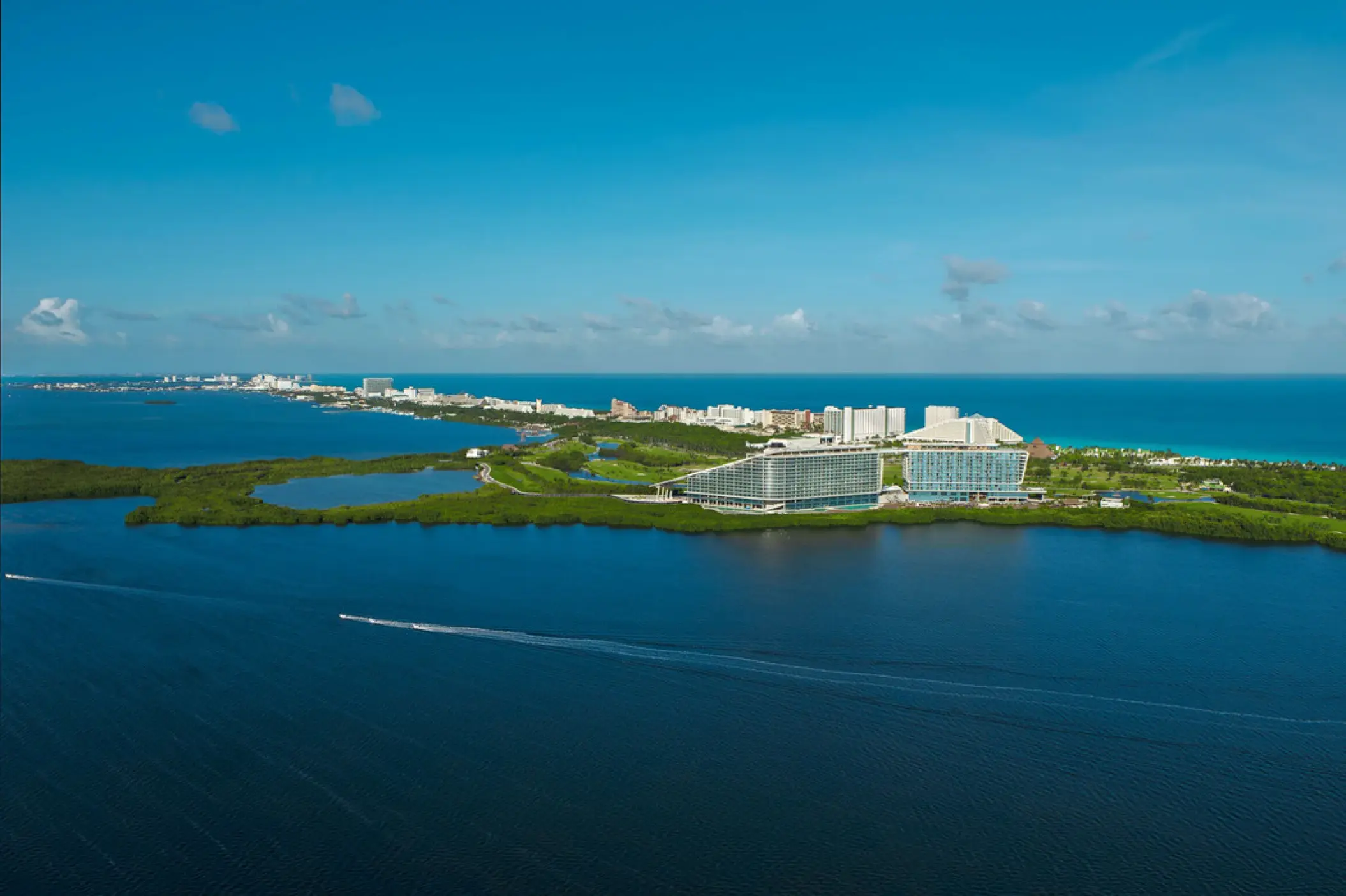Aerial view of Hyatt Vivid Grand Island between the Nichupte Lagoon and Caribbean Sea, Cancun