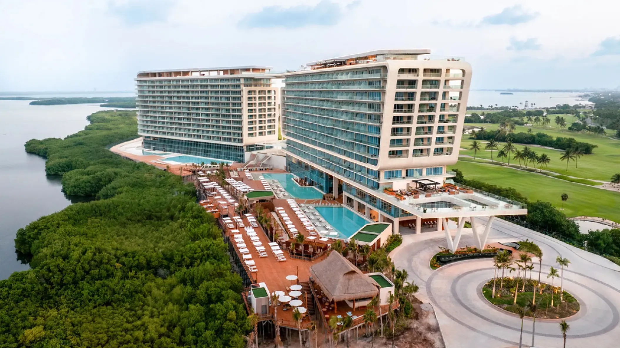 Aerial view of Hyatt Vivid Grand Island buildings and pool deck, Cancun