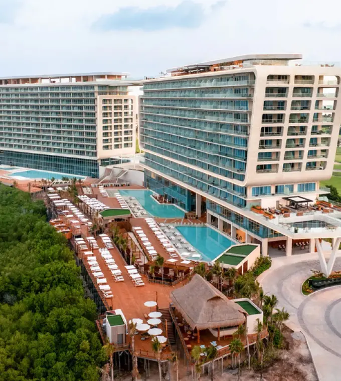 Aerial view of Hyatt Vivid Grand Island buildings and pool deck, Cancun