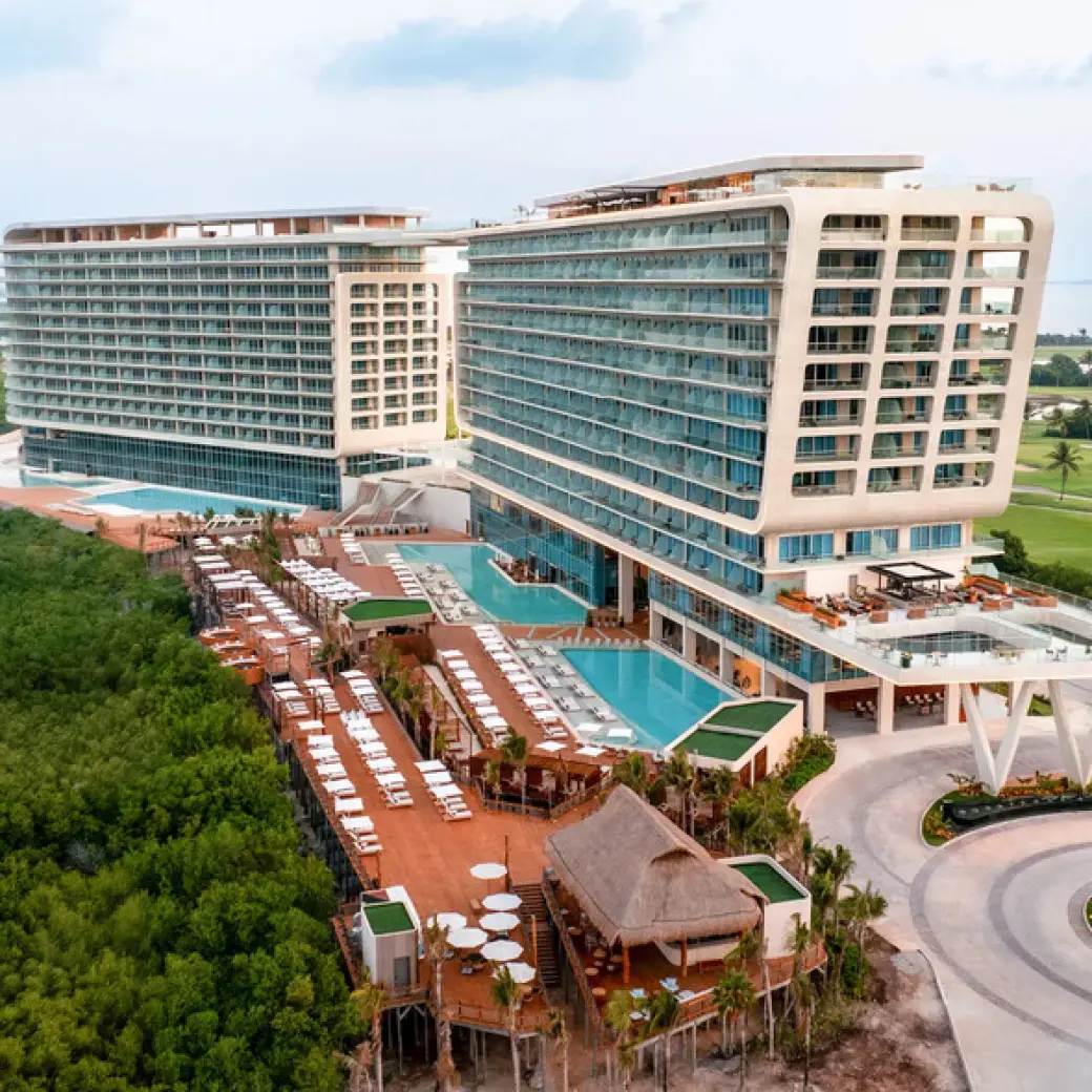 Aerial view of Hyatt Vivid Grand Island buildings and pool deck, Cancun