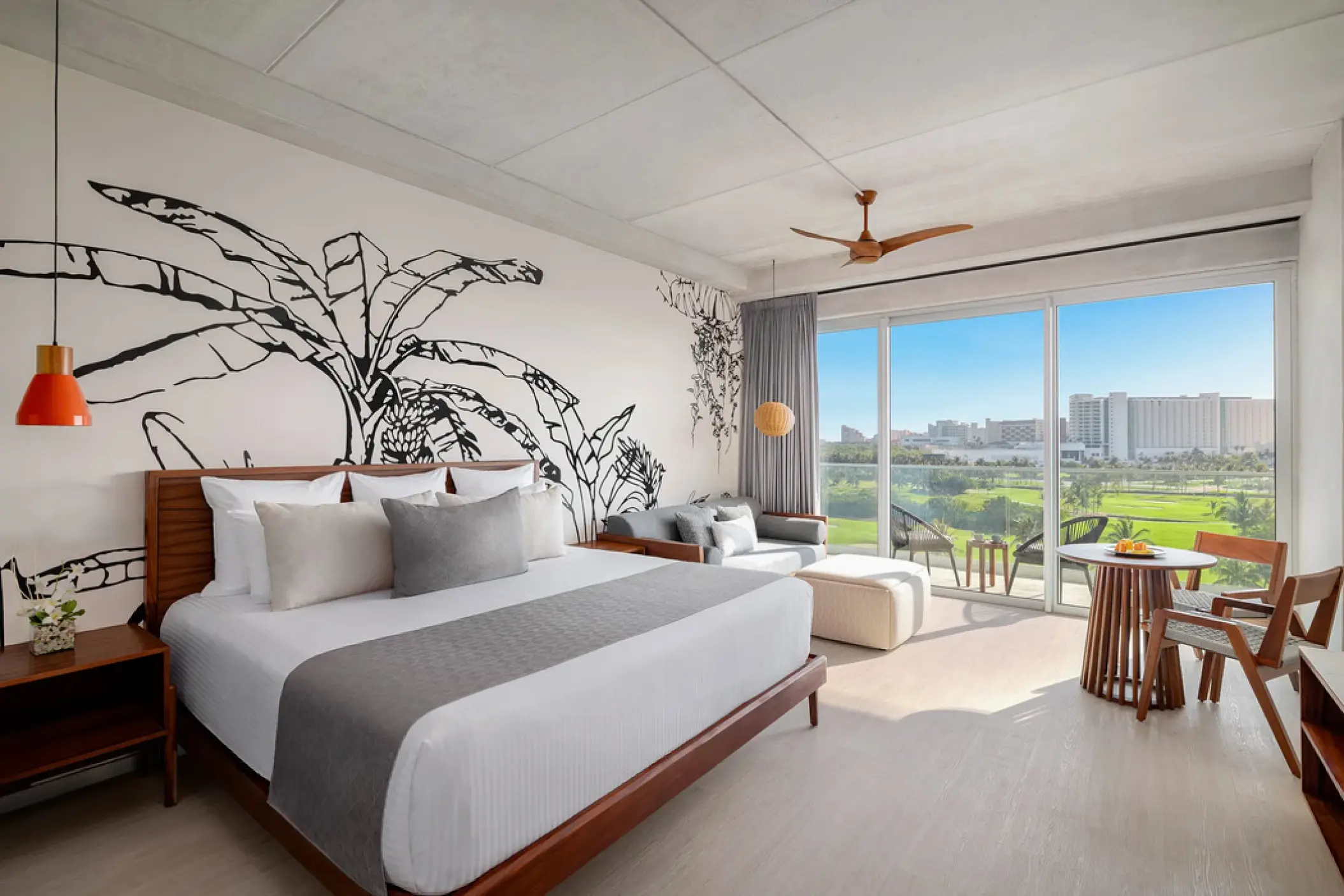 Junior suite with golf course views and modern tropical decor at Hyatt Vivid Grand Island, Cancun