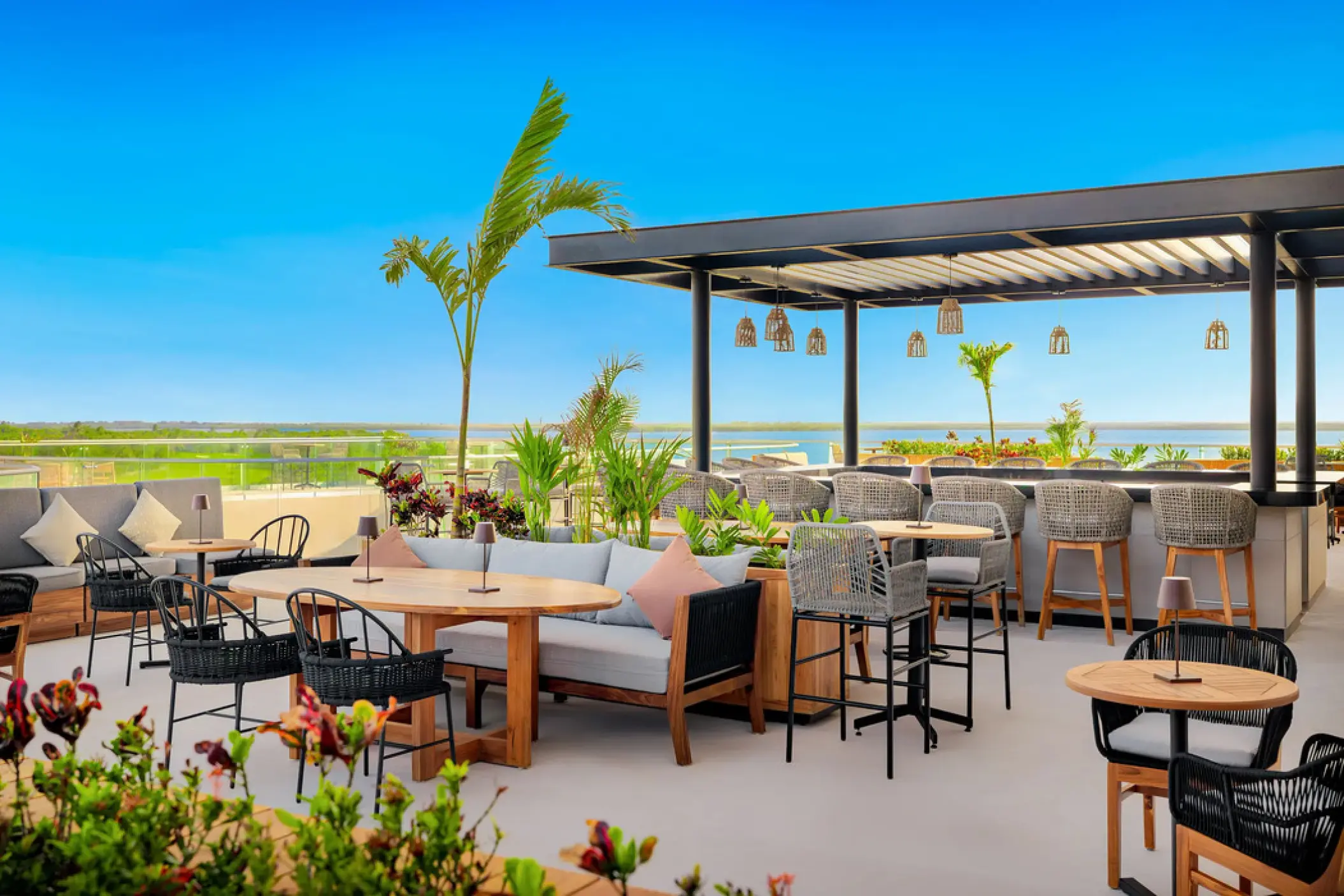 Serenity Lounge rooftop bar with outdoor seating at Hyatt Vivid Grand Island, Cancun
