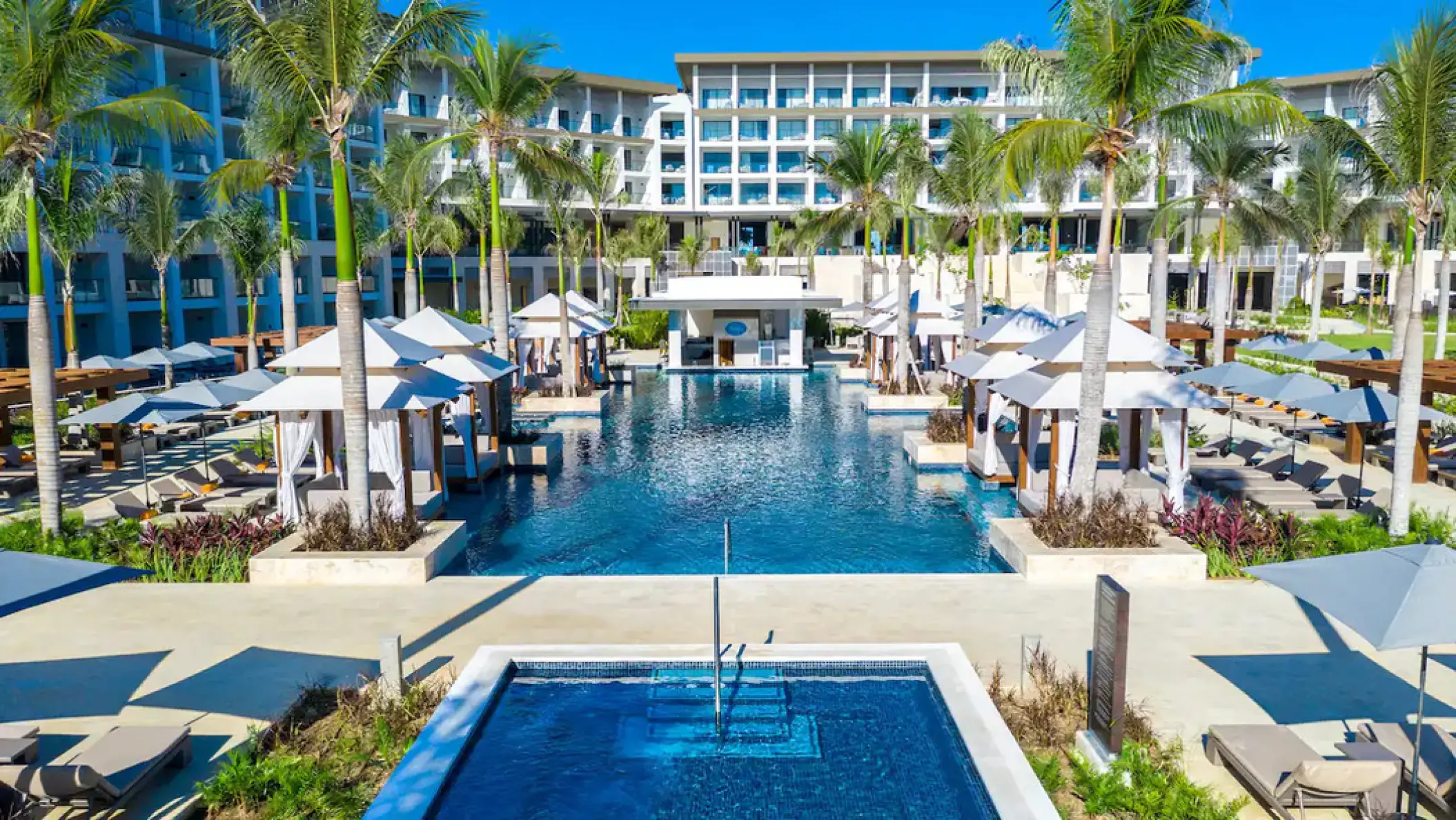 Pool cabanas and resort buildings at Hyatt Zilara Cap Cana, Punta Cana