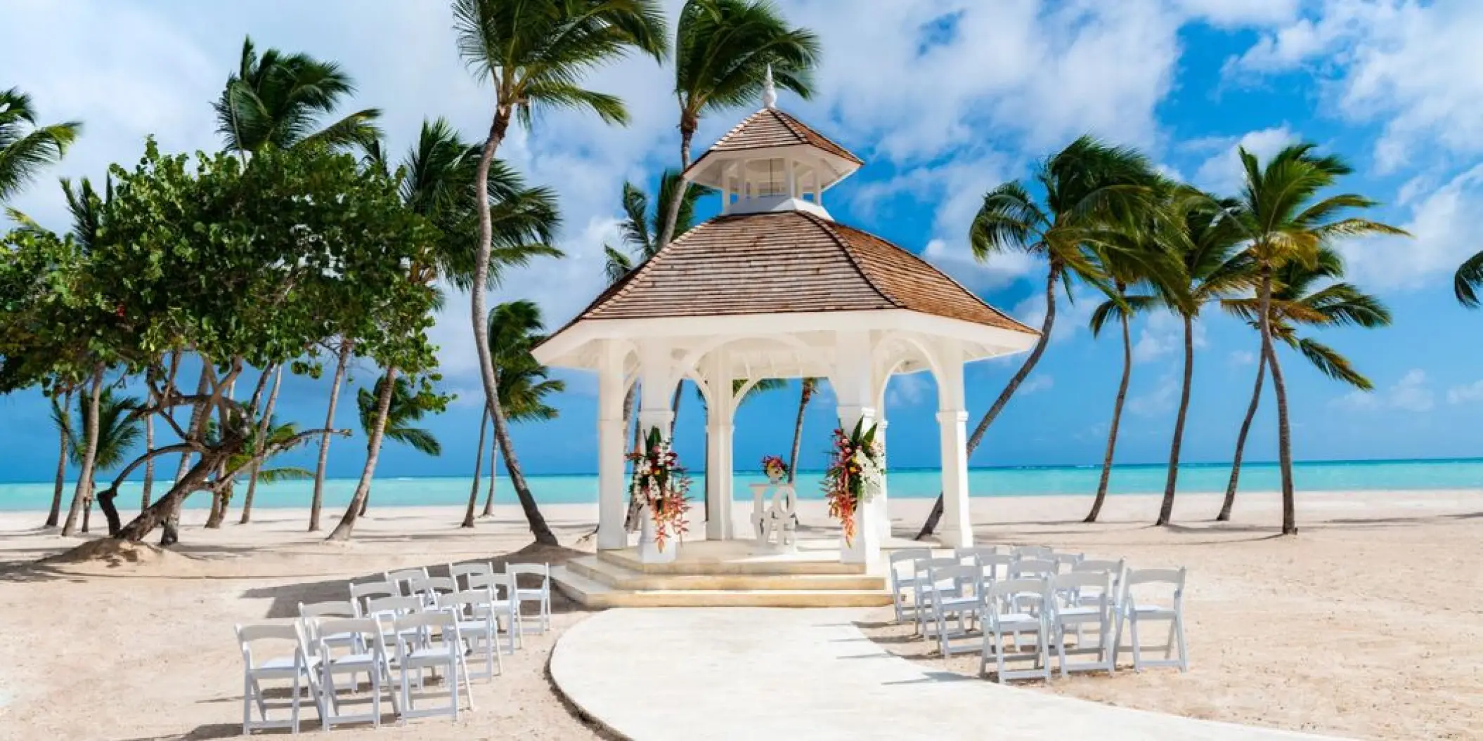 White beachfront gazebo wedding ceremony at Hyatt Zilara Cap Cana, Punta Cana