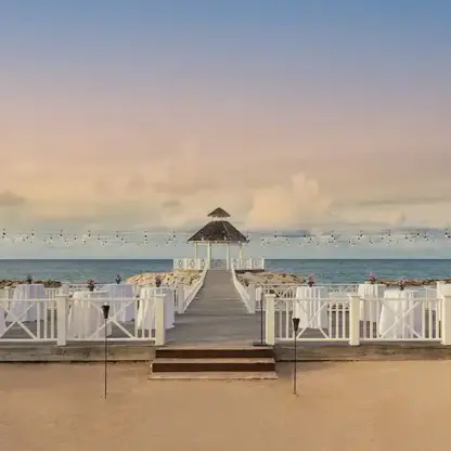 Ocean gazebo wedding reception setup with high-top tables at Hyatt Zilara Rose Hall, Montego Bay
