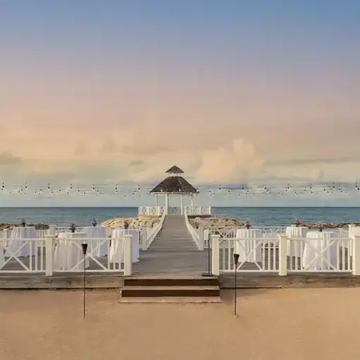 Ocean gazebo wedding reception setup with high-top tables at Hyatt Zilara Rose Hall, Montego Bay