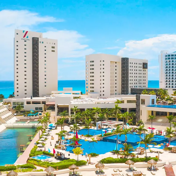 Hyatt Ziva Cancun buildings and swimming pools overlooking the ocean, Cancun