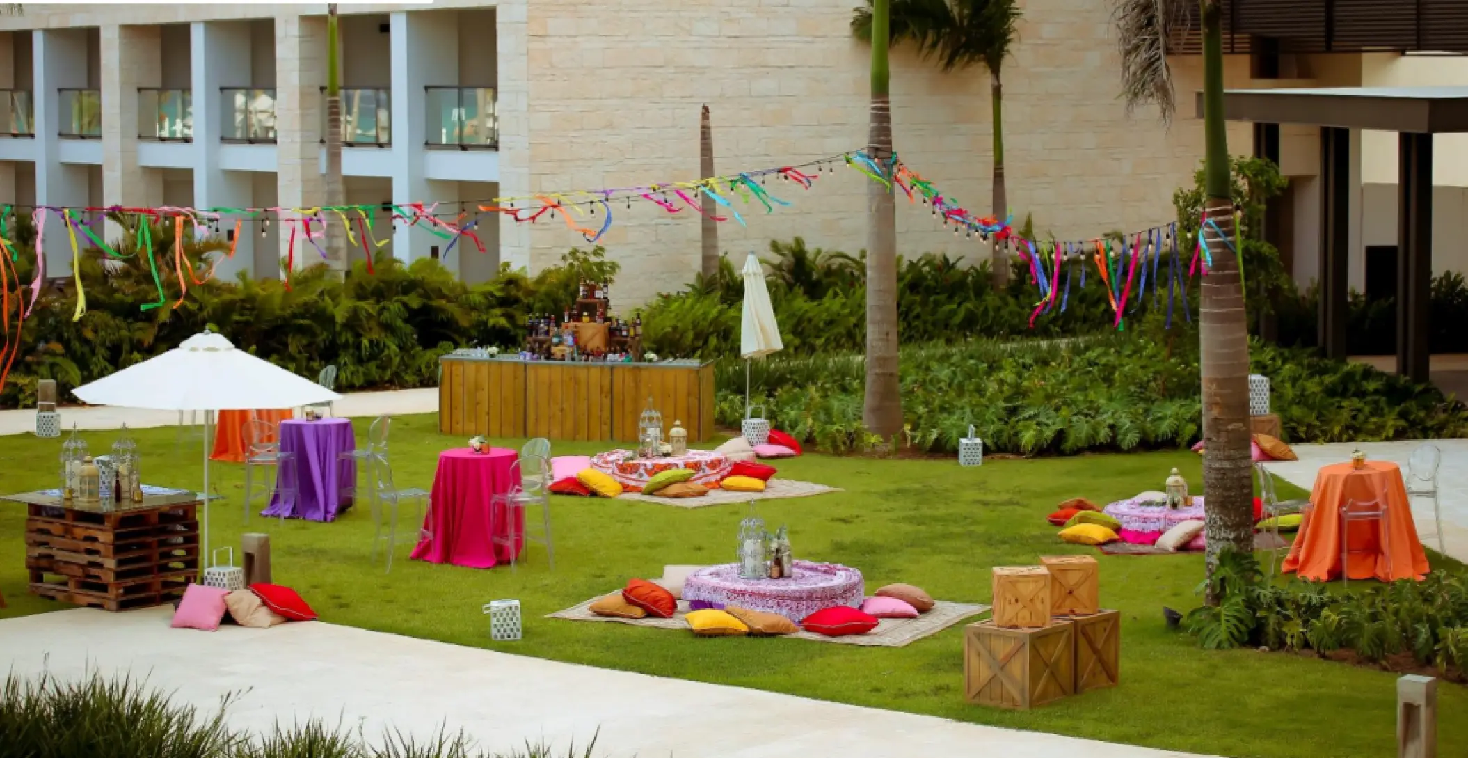 Colorful wedding reception setup on the El Seibo Lawn at Hyatt Ziva Cap Cana, Punta Cana