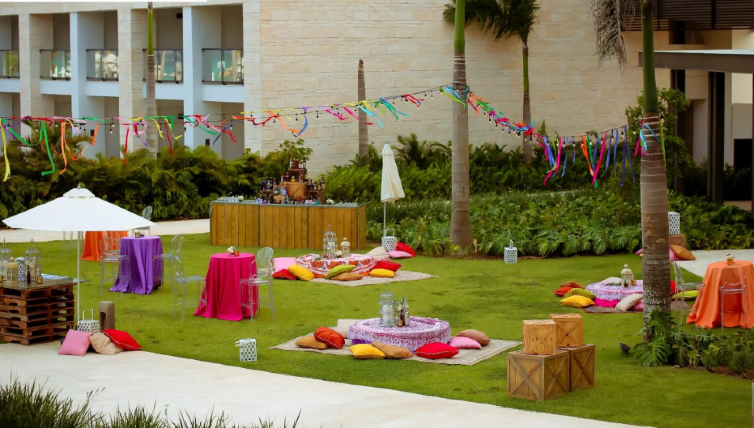 Colorful wedding reception setup on the El Seibo Lawn at Hyatt Ziva Cap Cana, Punta Cana
