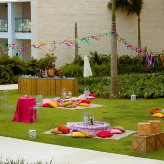 Colorful wedding reception setup on the El Seibo Lawn at Hyatt Ziva Cap Cana, Punta Cana