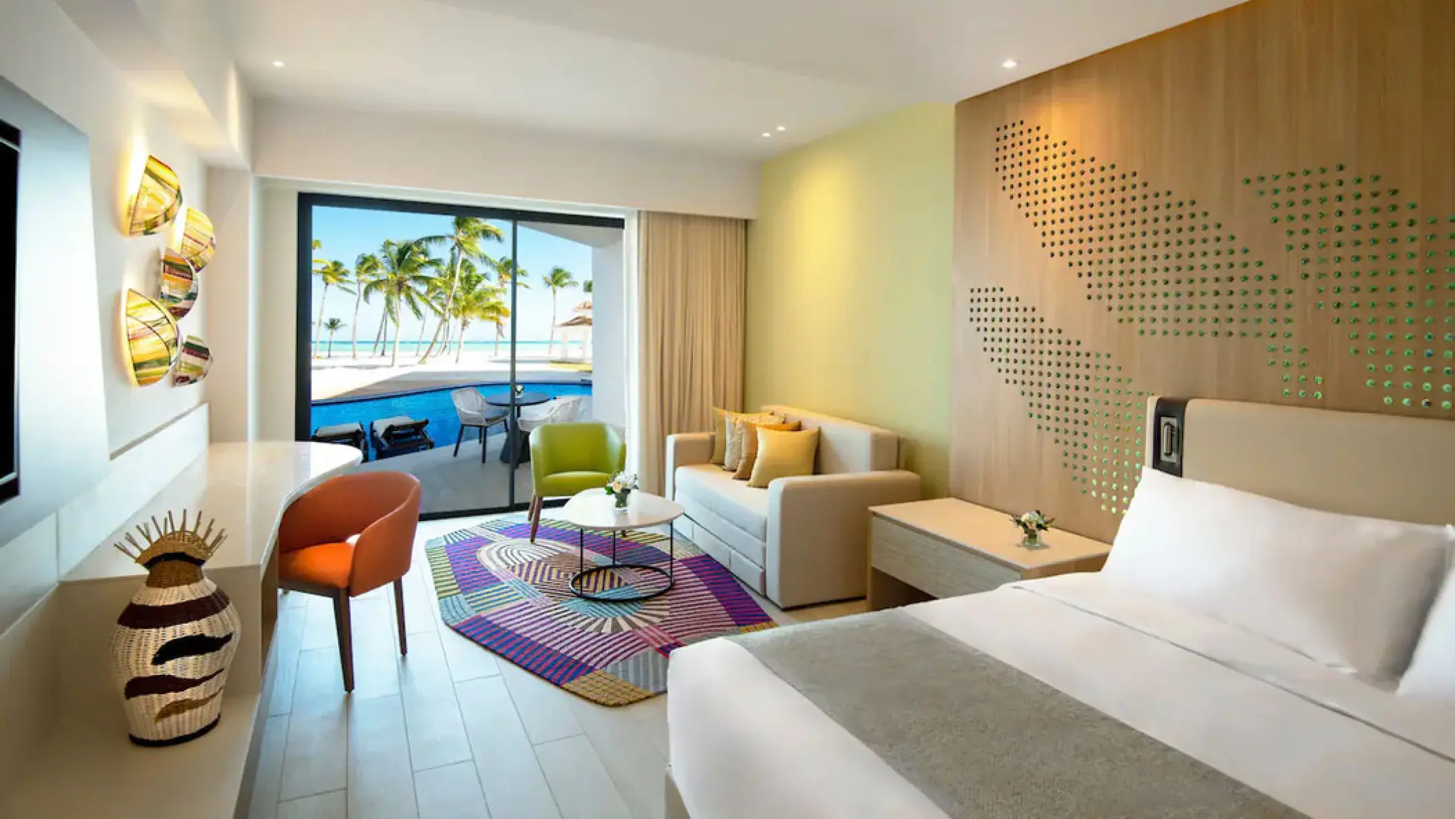 Hyatt Ziva Cap Cana oceanfront junior suite swim-up room with king bed and pool access, Punta Cana