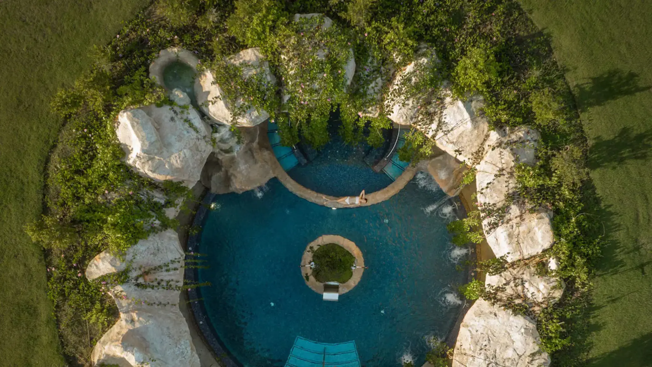 Aerial view of the Larimar Spa cenote-style pool at Hyatt Ziva Cap Cana, Punta Cana