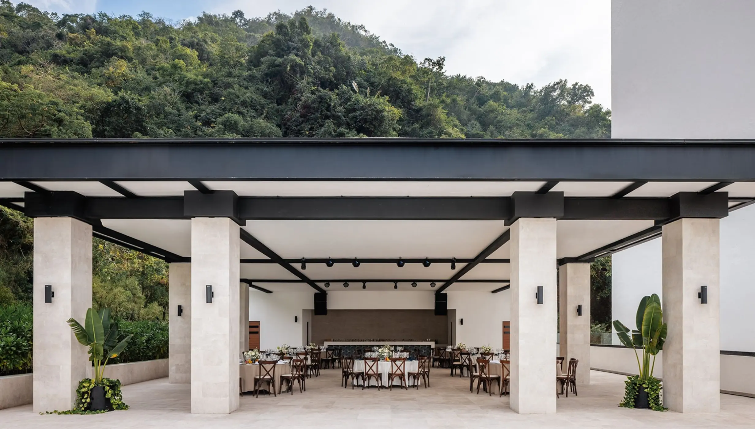 Covered terrace wedding reception with mountain views at Hyatt Ziva Puerto Vallarta