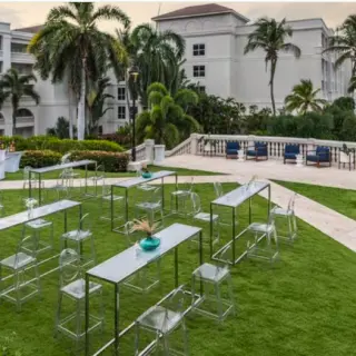 Lawn wedding reception setup with modern high-top tables at Hyatt Ziva Rose Hall, Montego Bay