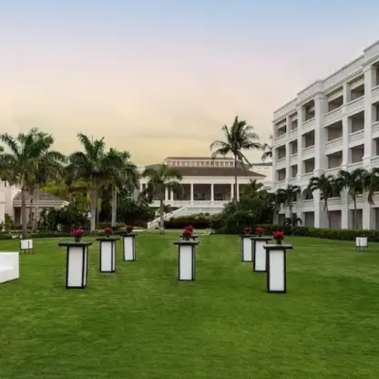 East Lawn wedding reception setup with white lounge furniture at Hyatt Ziva Rose Hall, Montego Bay