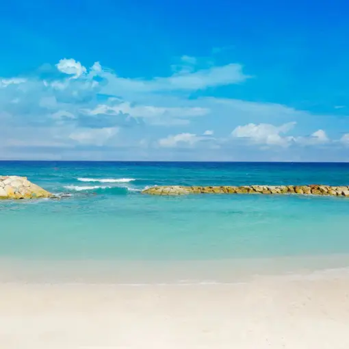 White sand beach and oceanfront gazebo at Hyatt Ziva Rose Hall, Montego Bay