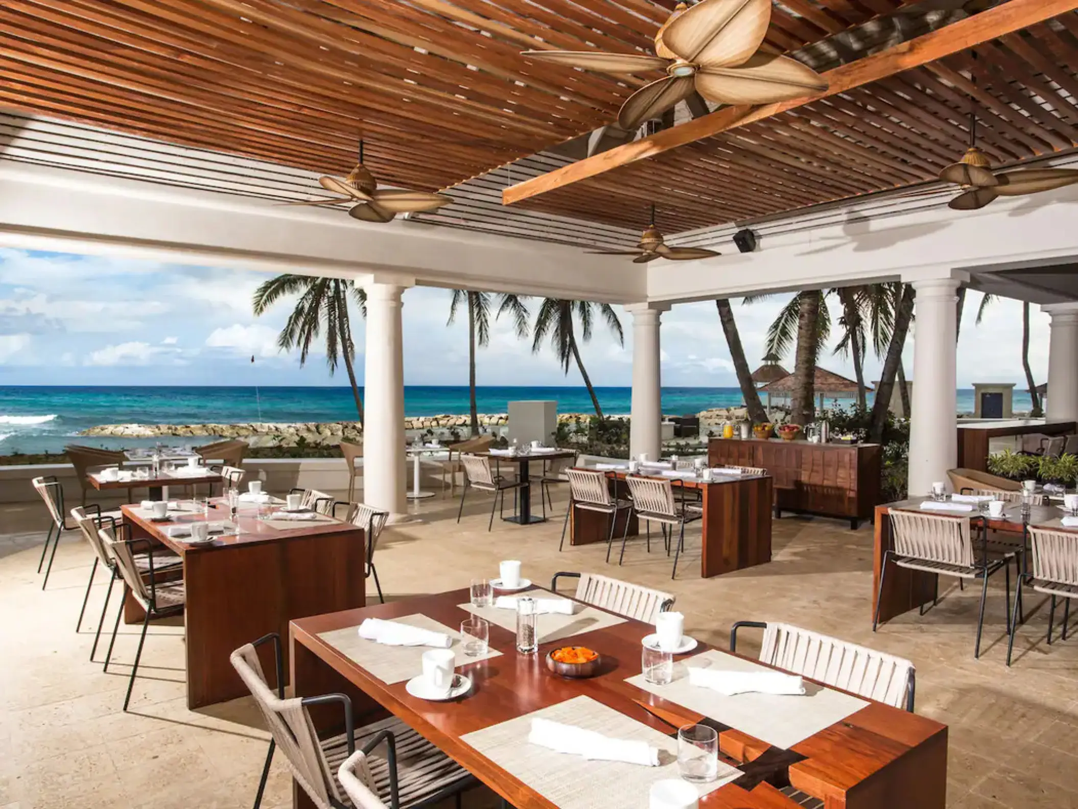 Calypzo beachfront restaurant with outdoor seating at Hyatt Ziva Rose Hall, Montego Bay