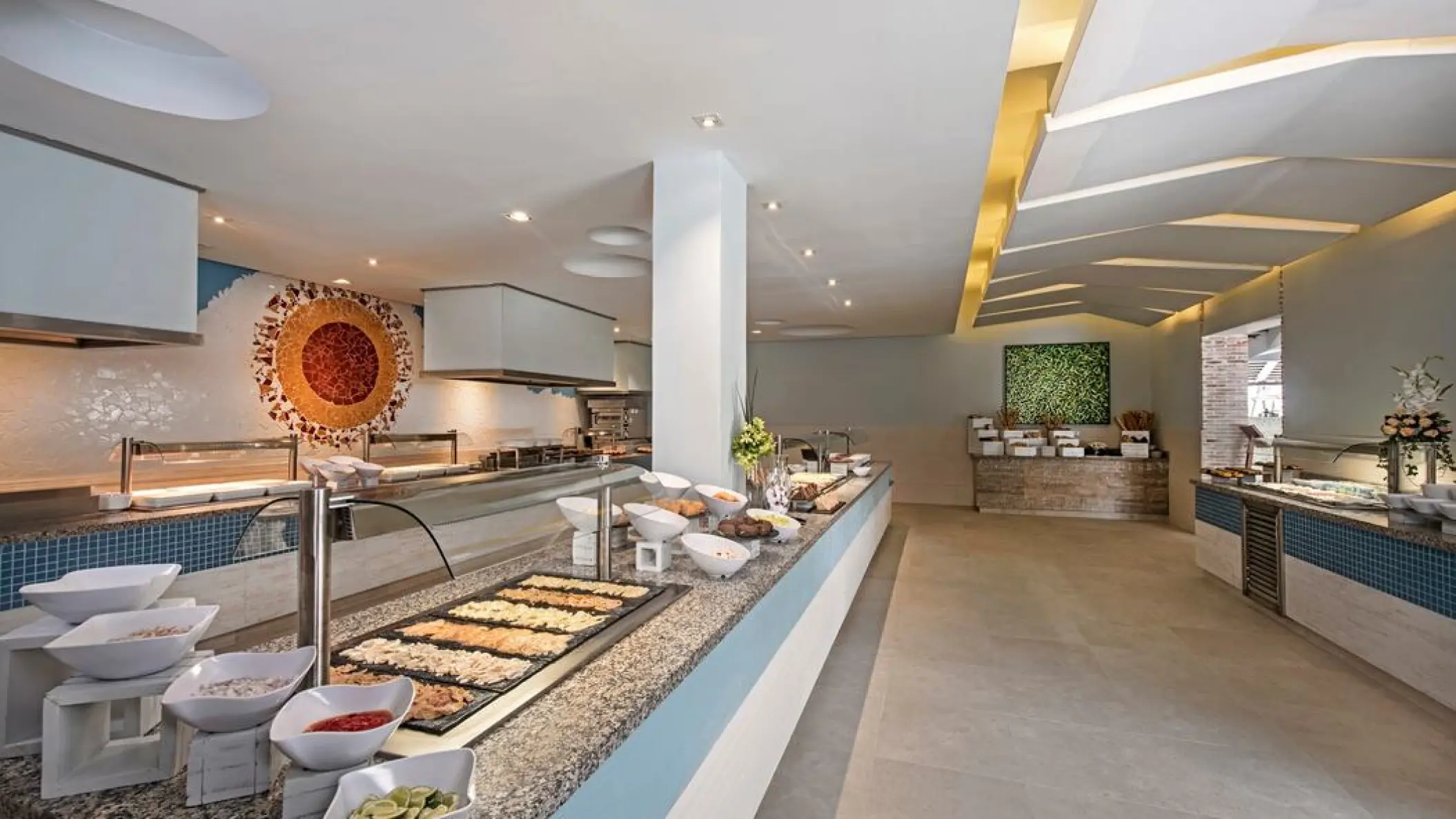 Buffet restaurant food stations and dining area at Iberostar Selection Bavaro, Punta Cana