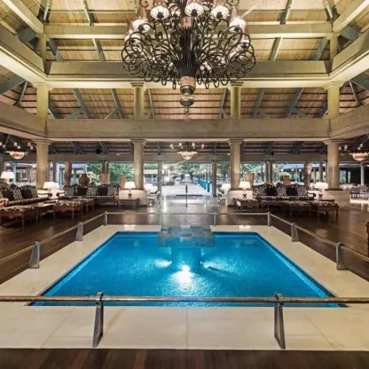 Indoor courtyard and fountain under a grand chandelier at Iberostar Selection Bavaro, Punta Cana