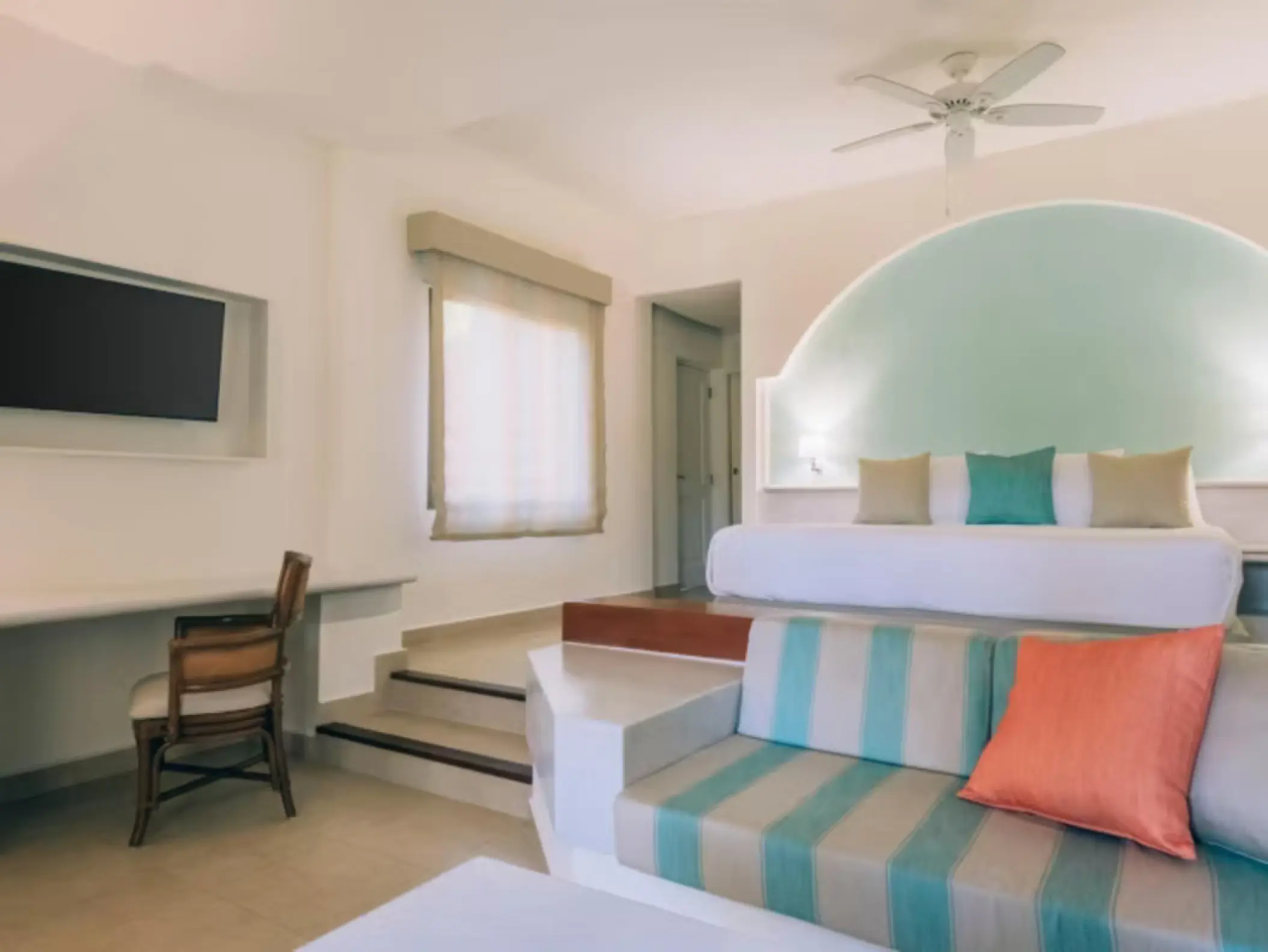 Suite interior with a sunken living area at Iberostar Selection Bavaro, Punta Cana