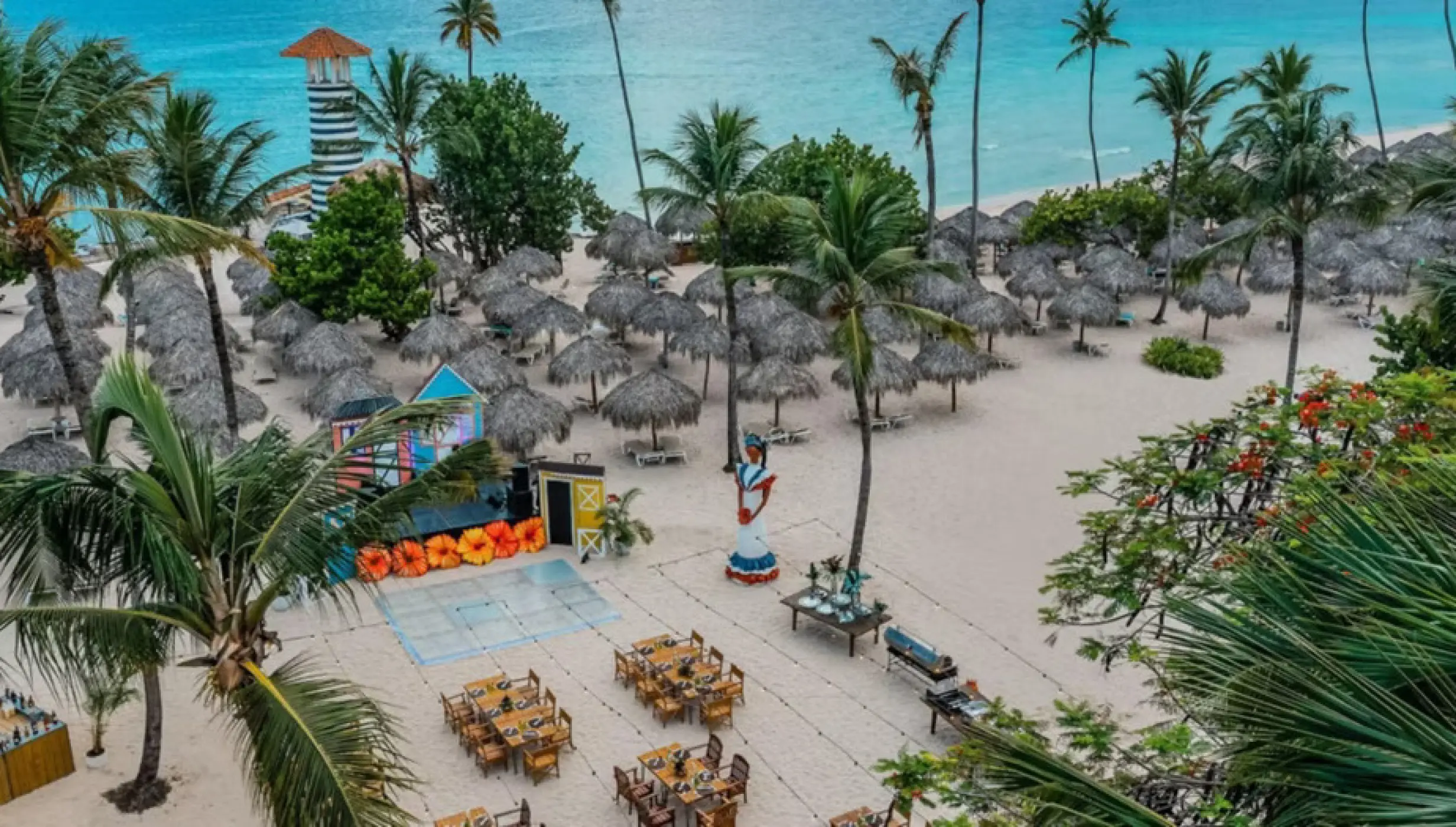 Beachfront wedding reception setup with dance floor at Iberostar Selection Hacienda Dominicus, La Romana