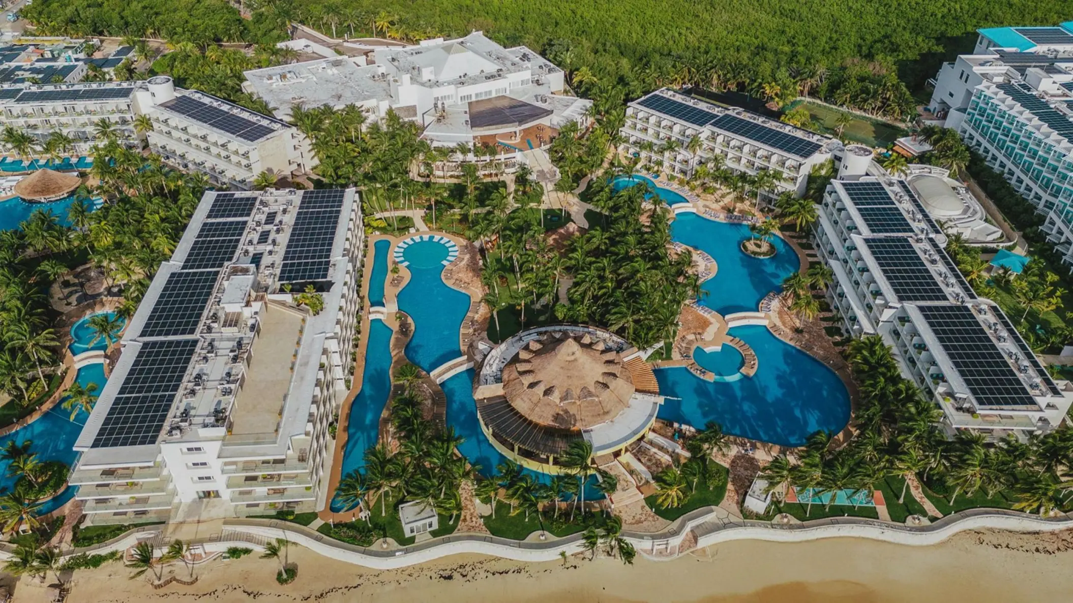 Aerial view of pools and beachfront suites at Iberostar Selection Riviera Cancun, Cancun