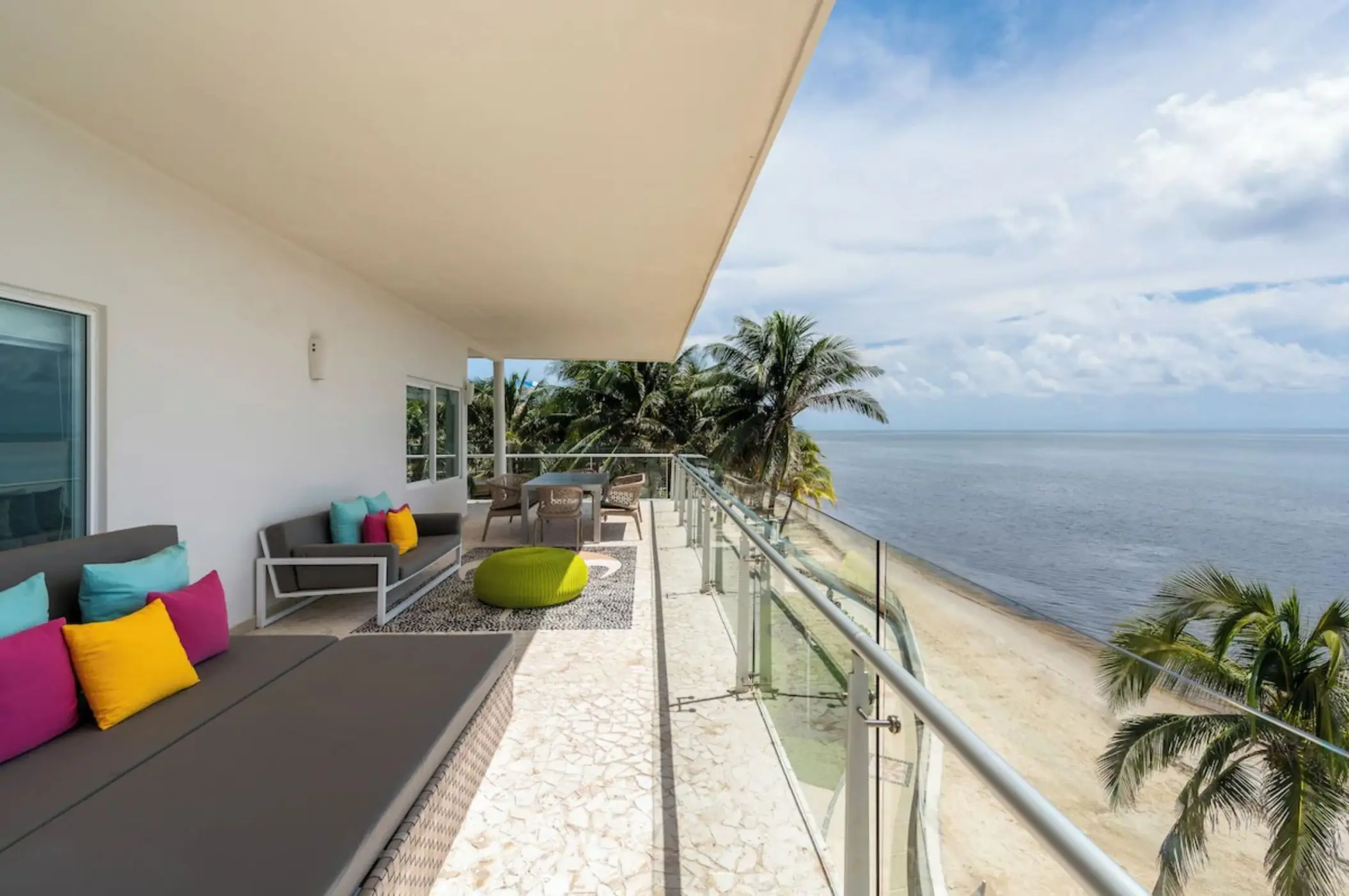 Suite balcony with lounge seating and ocean views at Iberostar Selection Riviera Cancun, Cancun