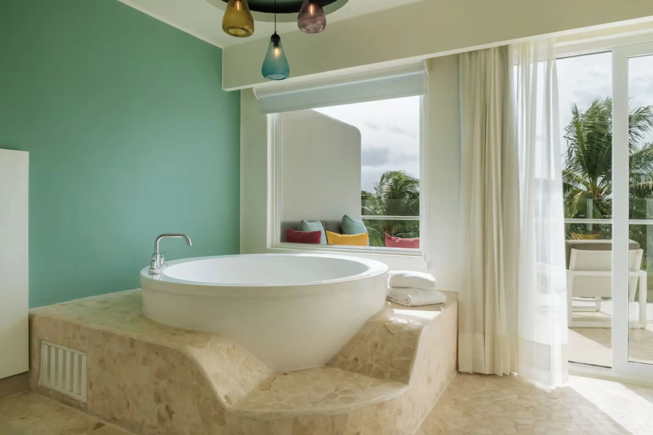 In-suite hot tub with balcony view at Iberostar Selection Riviera Cancun, Cancun