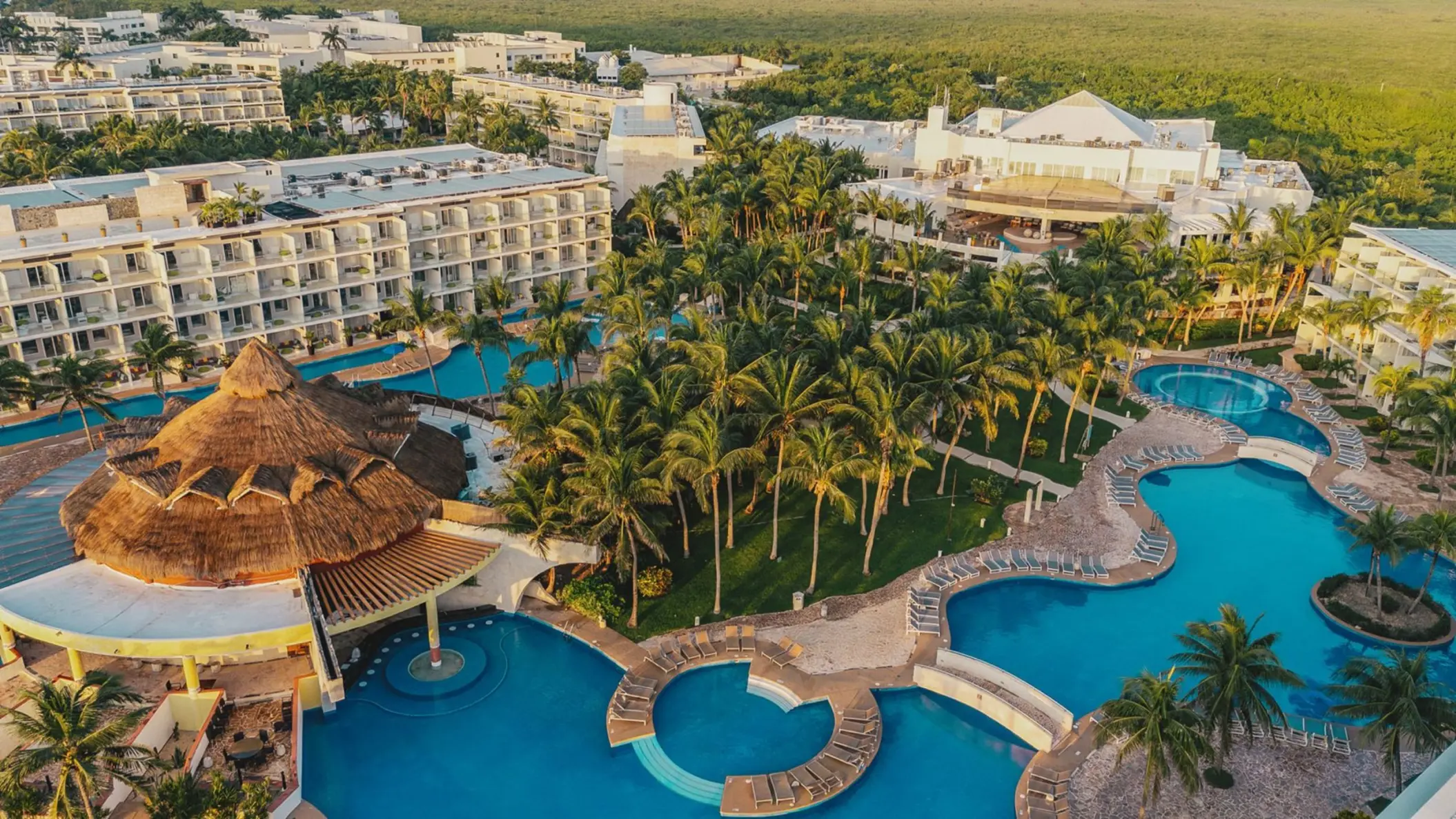 Aerial view of pools and tropical grounds at Iberostar Selection Riviera Cancun, Cancun