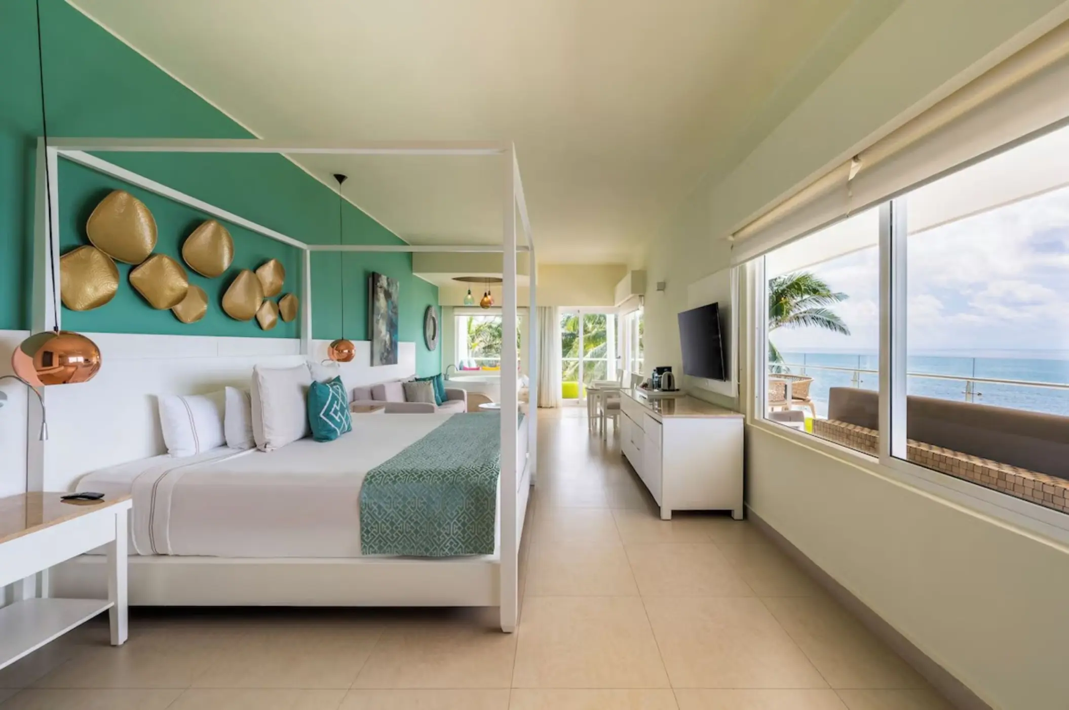 Iberostar Selection Riviera Cancun guest suite with canopy bed and ocean view, Cancun