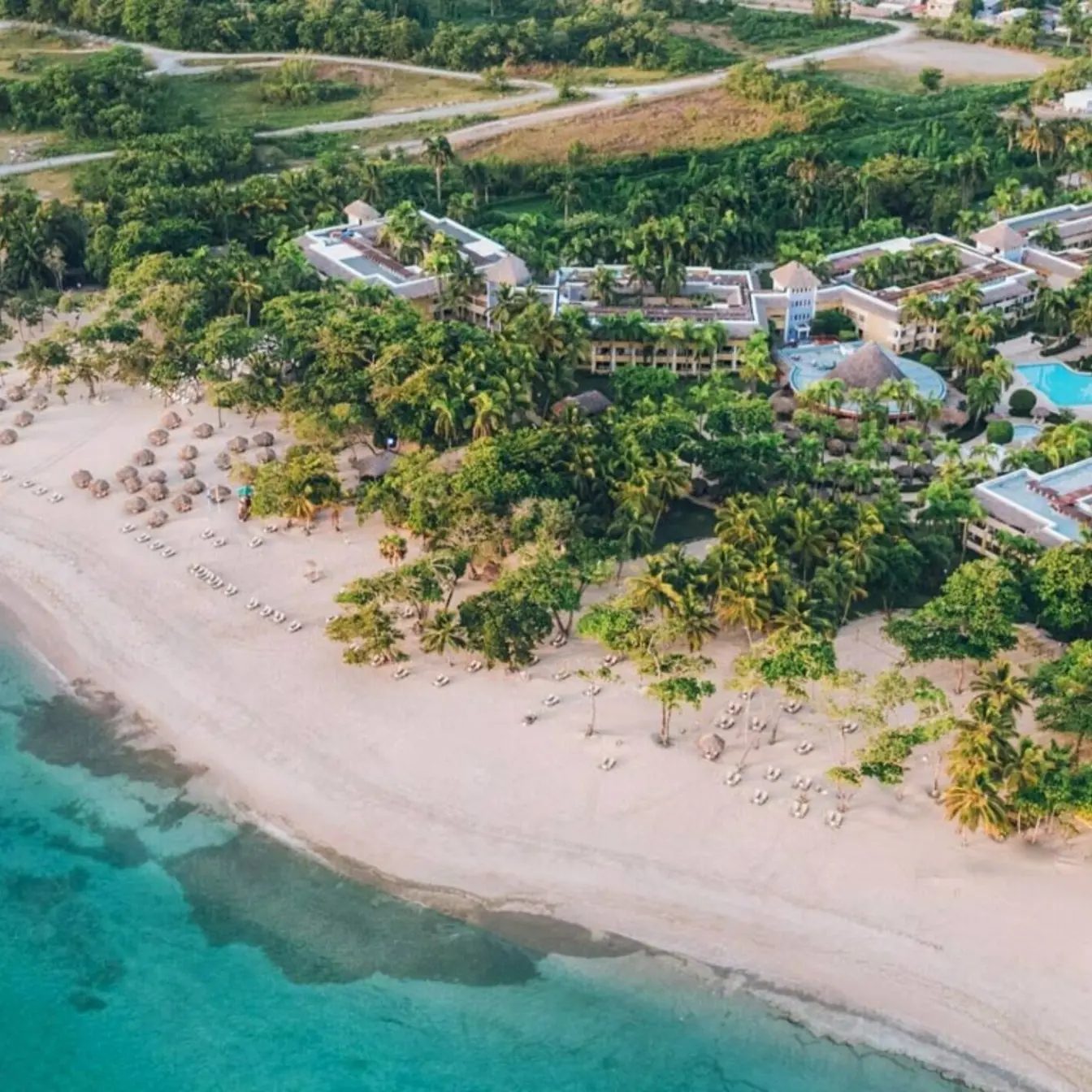 Aerial view of Iberostar Waves Costa Dorada beachfront and turquoise water, Puerto Plata