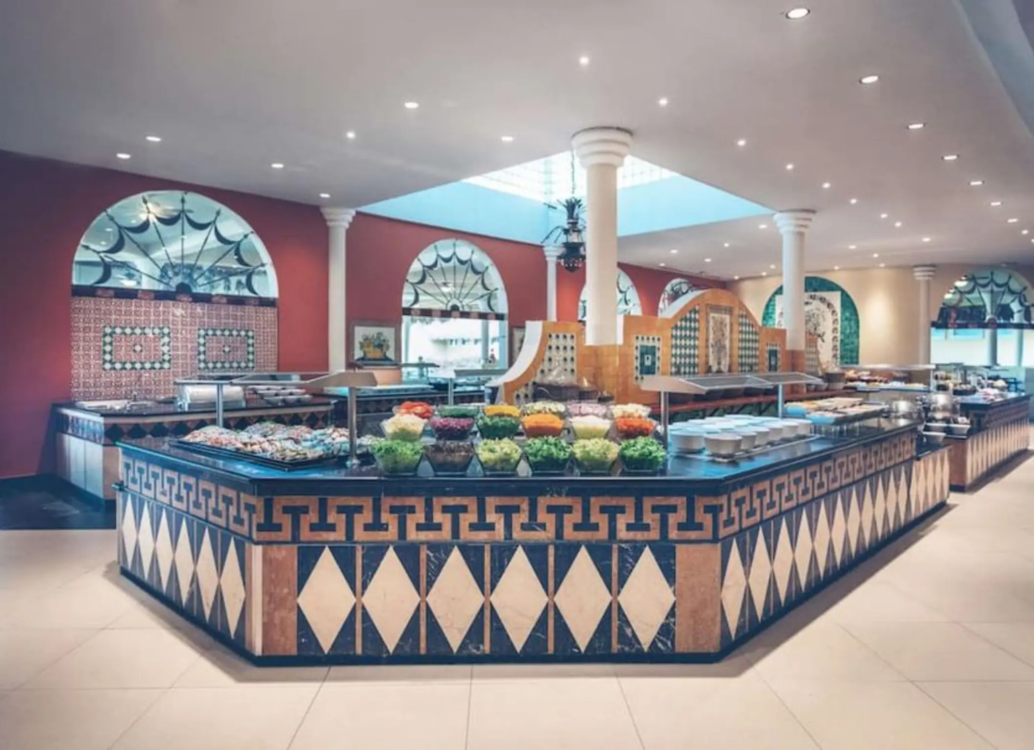 Buffet restaurant station with fresh salads and tiled counters at Iberostar Waves Costa Dorada, Puerto Plata