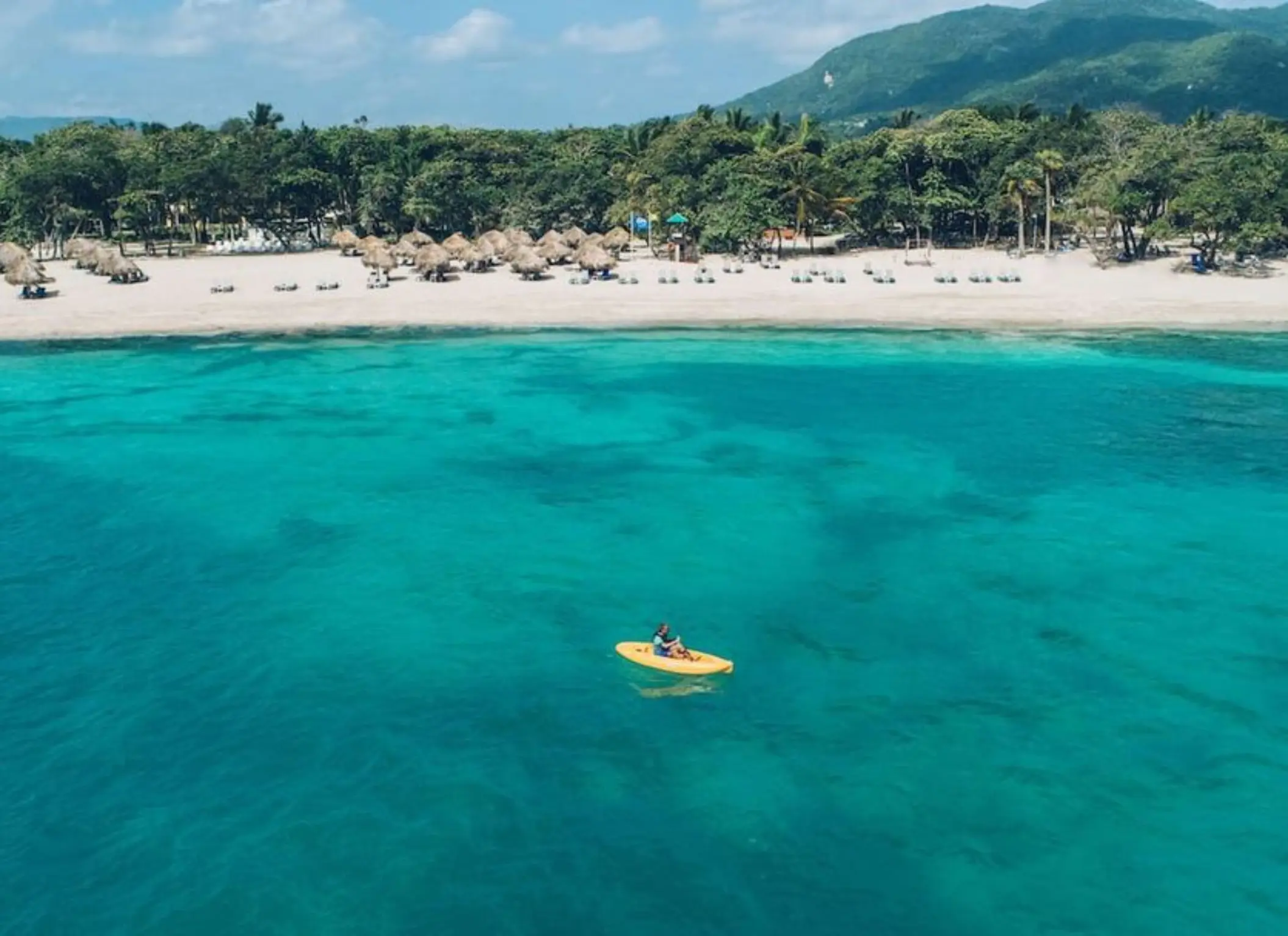 Kayaking in turquoise water off the beach at Iberostar Costa Dorada, Puerto Plata