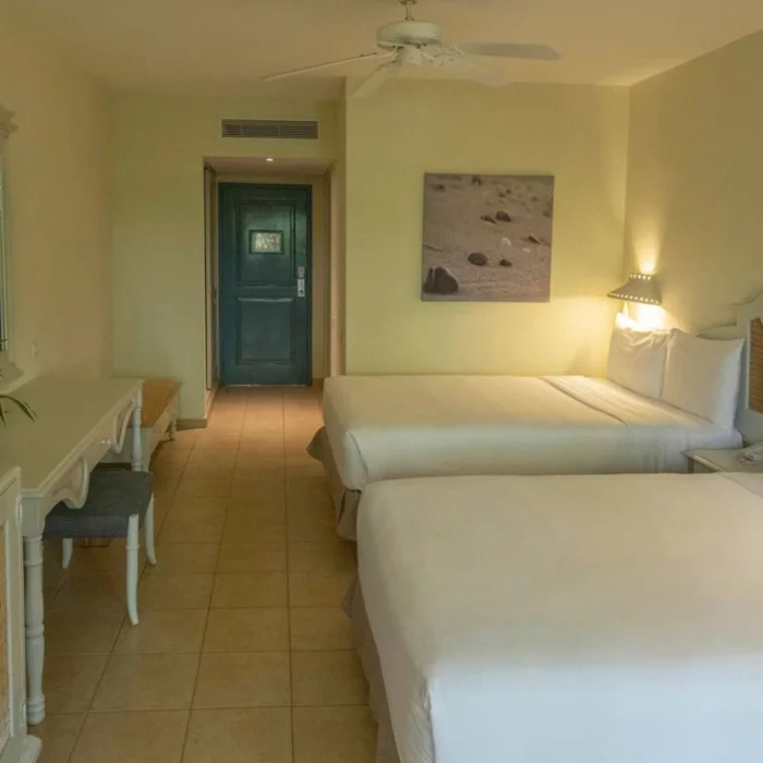 room with two beds at Iberostar Waves Costa Dorada