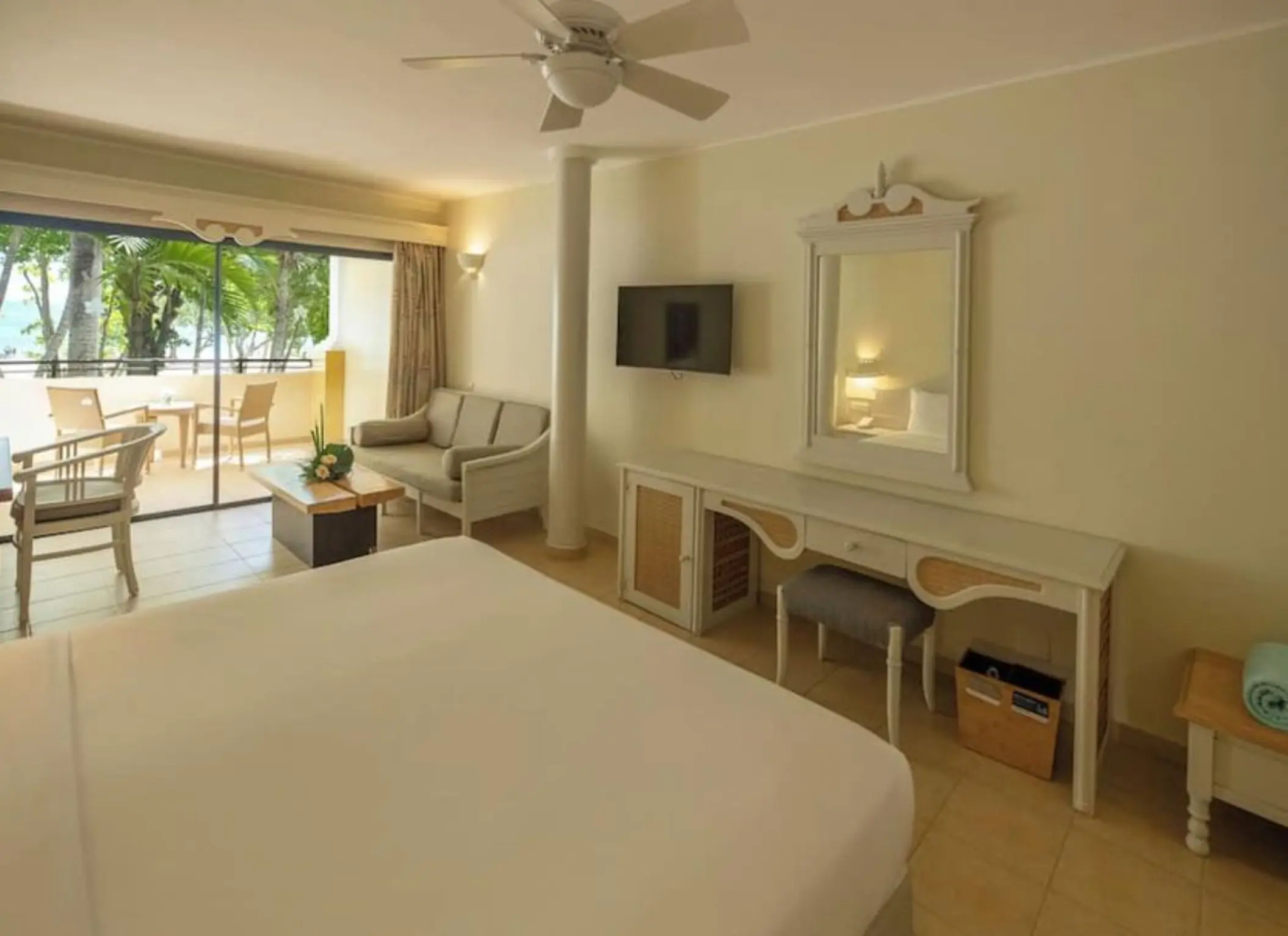 Iberostar Costa Dorada guest suite with a private balcony and seating area, Puerto Plata