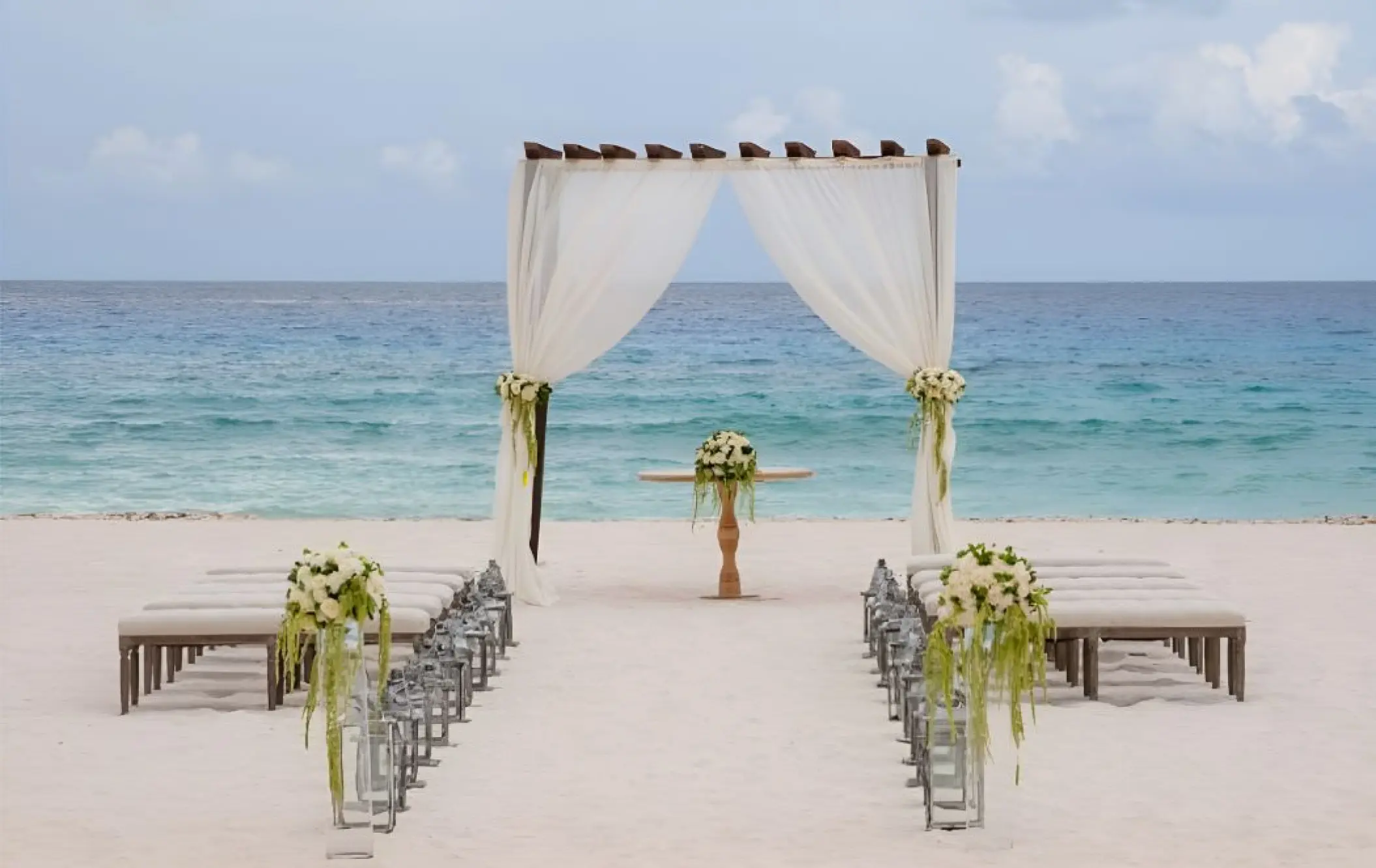 Beachfront wedding ceremony setup at Iberostar Waves Cozumel, Cozumel