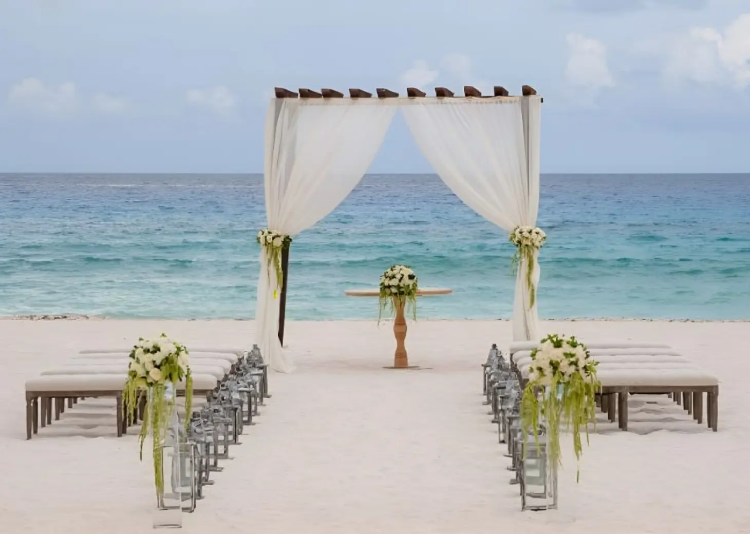 Beachfront wedding ceremony setup at Iberostar Waves Cozumel, Cozumel