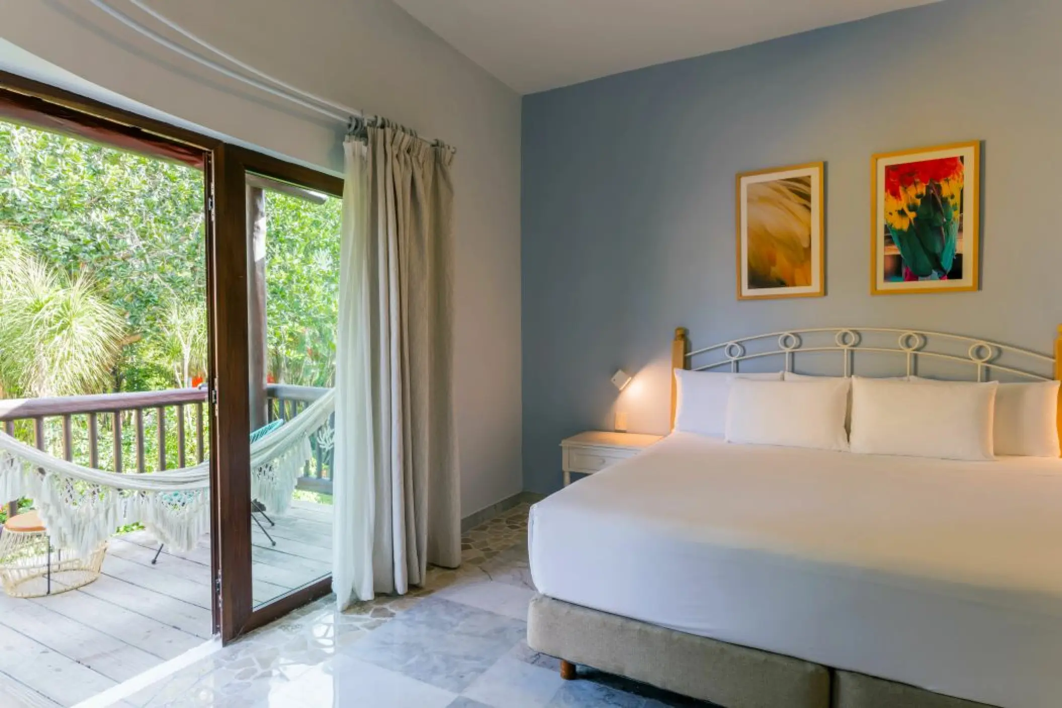 Iberostar Waves Cozumel suite with a private balcony and hammock, Cozumel