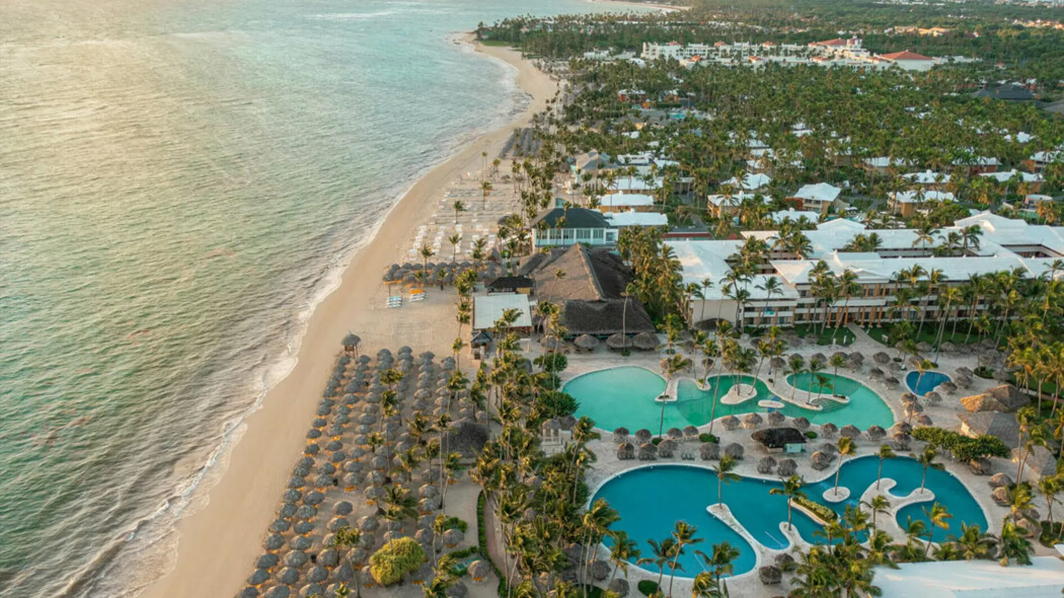 Aerial view of pools and beachfront grounds at Iberostar Waves Dominicana, Punta Cana