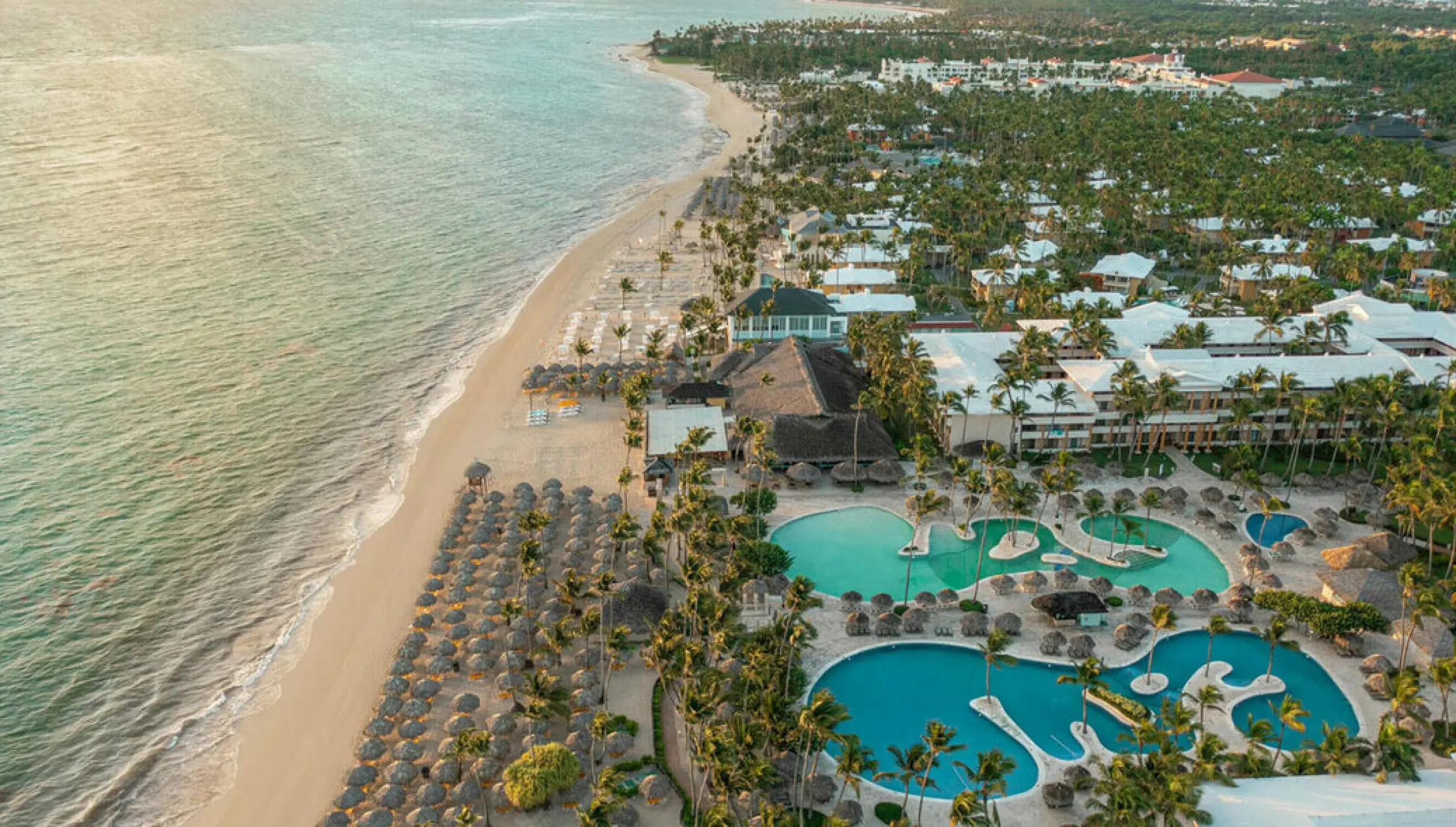 Aerial view of pools and beachfront grounds at Iberostar Waves Dominicana, Punta Cana