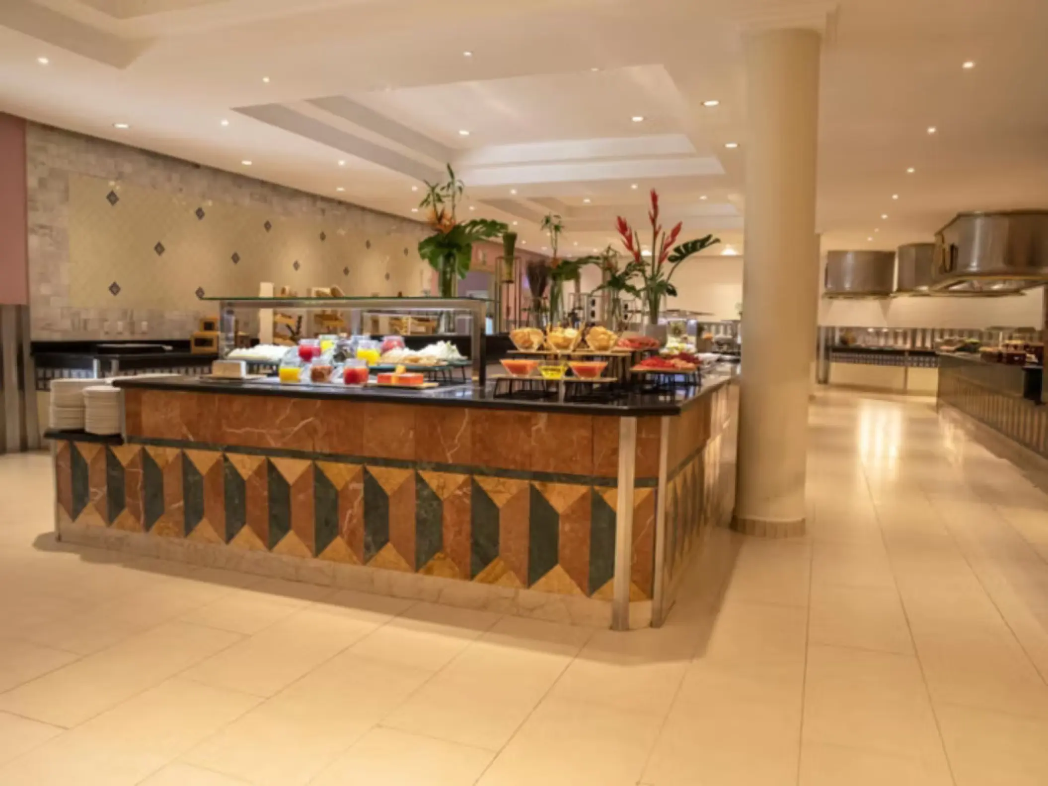 Buffet restaurant station with fresh fruit and pastries at Iberostar Waves Dominicana, Punta Cana