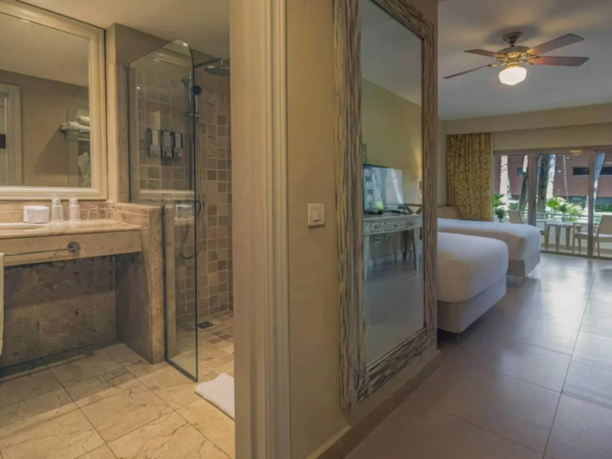 Double bed room with glass walk-in shower and balcony at Iberostar Waves Dominicana, Punta Cana