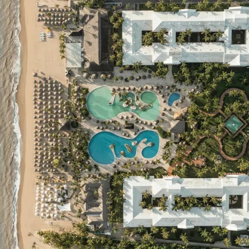 Aerial view of Iberostar Waves Dominicana pools and beachfront grounds, Punta Cana