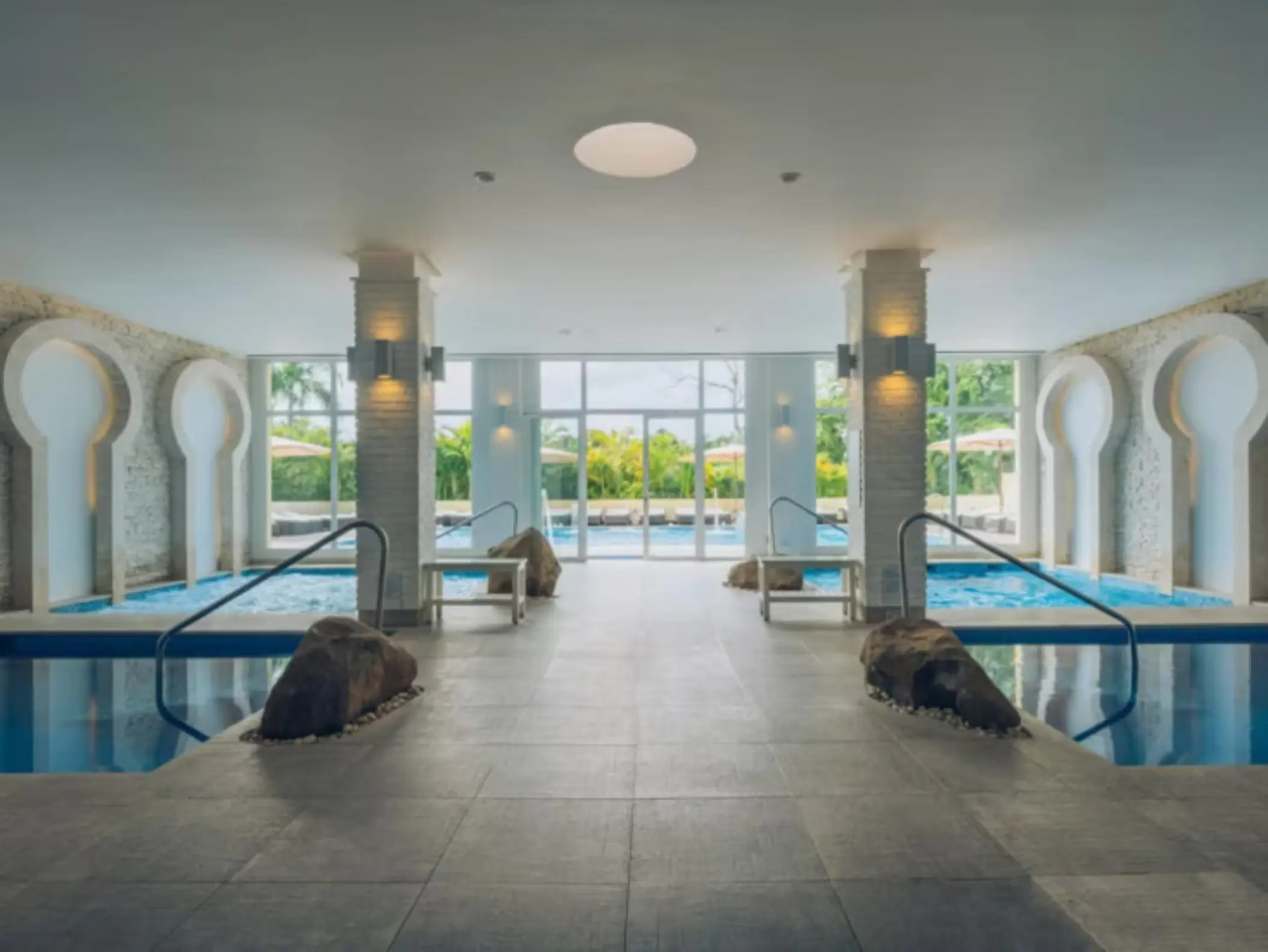 Indoor spa pools with arched alcoves at Iberostar Waves Dominicana, Punta Cana