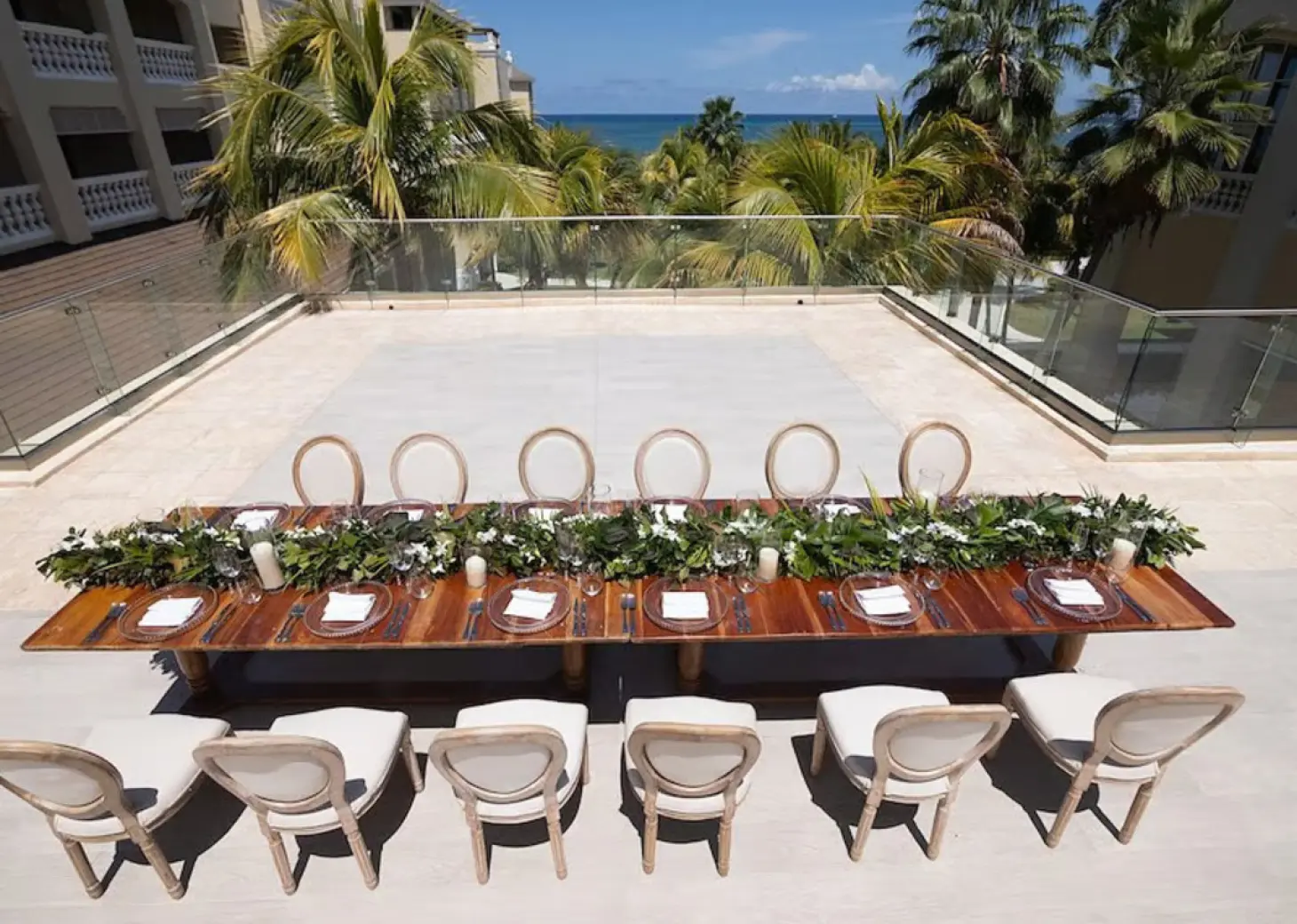 Outdoor wedding reception table at Bob Marley Terrace, Iberostar Waves Rose Hall Beach