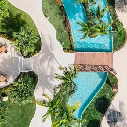 Aerial view of Calypso Terrace venue and winding pool at Iberostar Waves Rose Hall Beach, Montego Bay